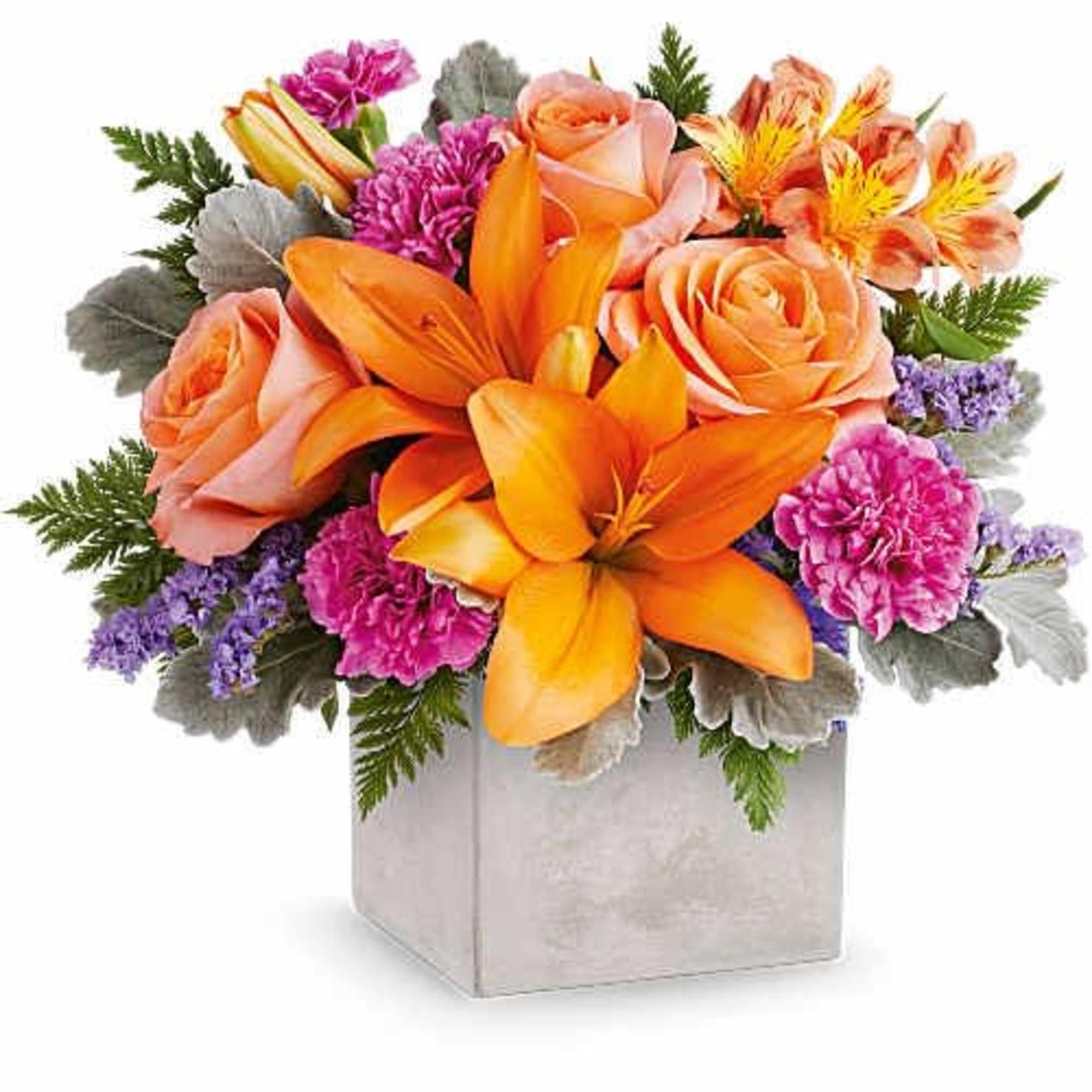 Bright orange lilies take center stage in this Garden Gem flower arrangement