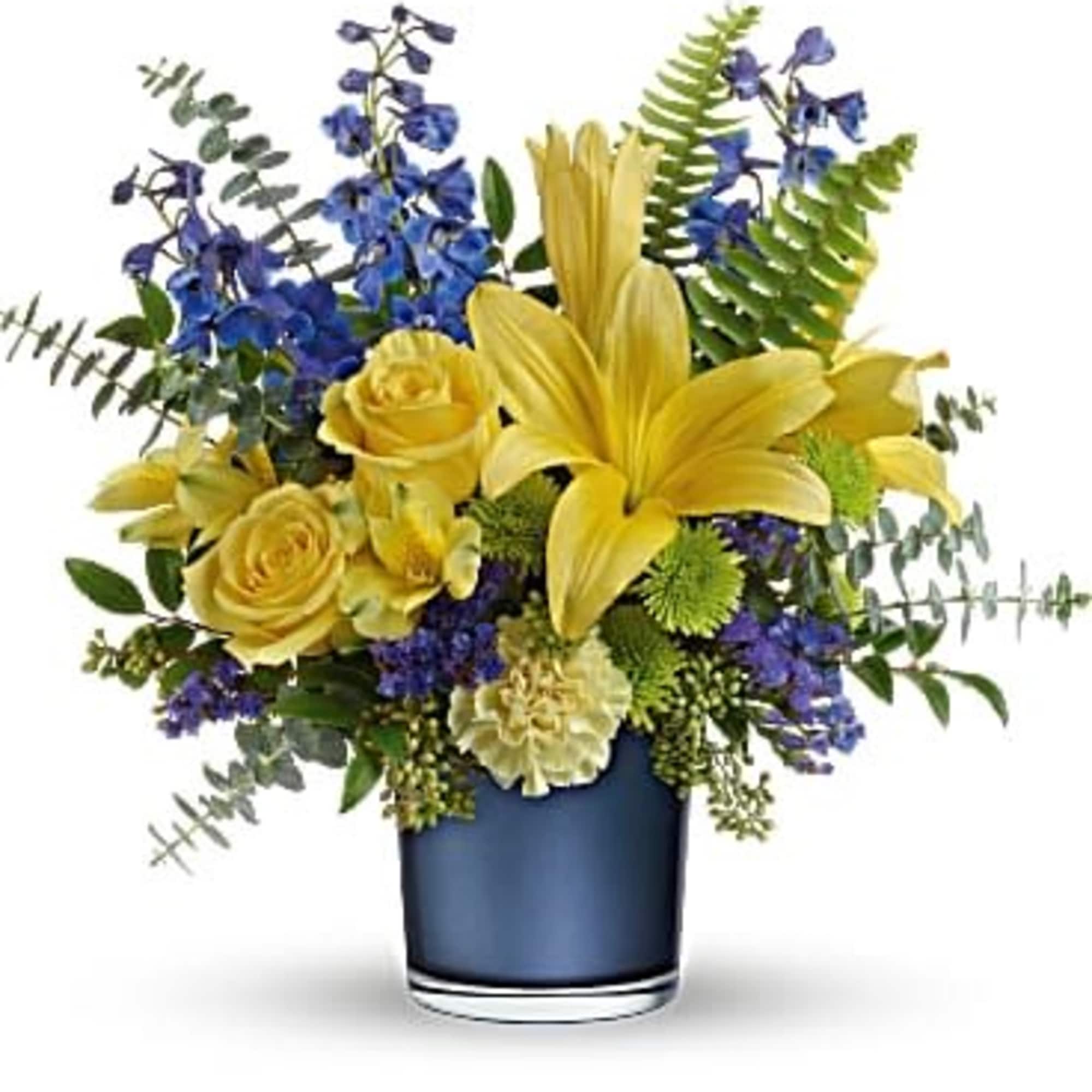 Bright yellow lilies and roses burst against tall sapphire-blue delphinium in this