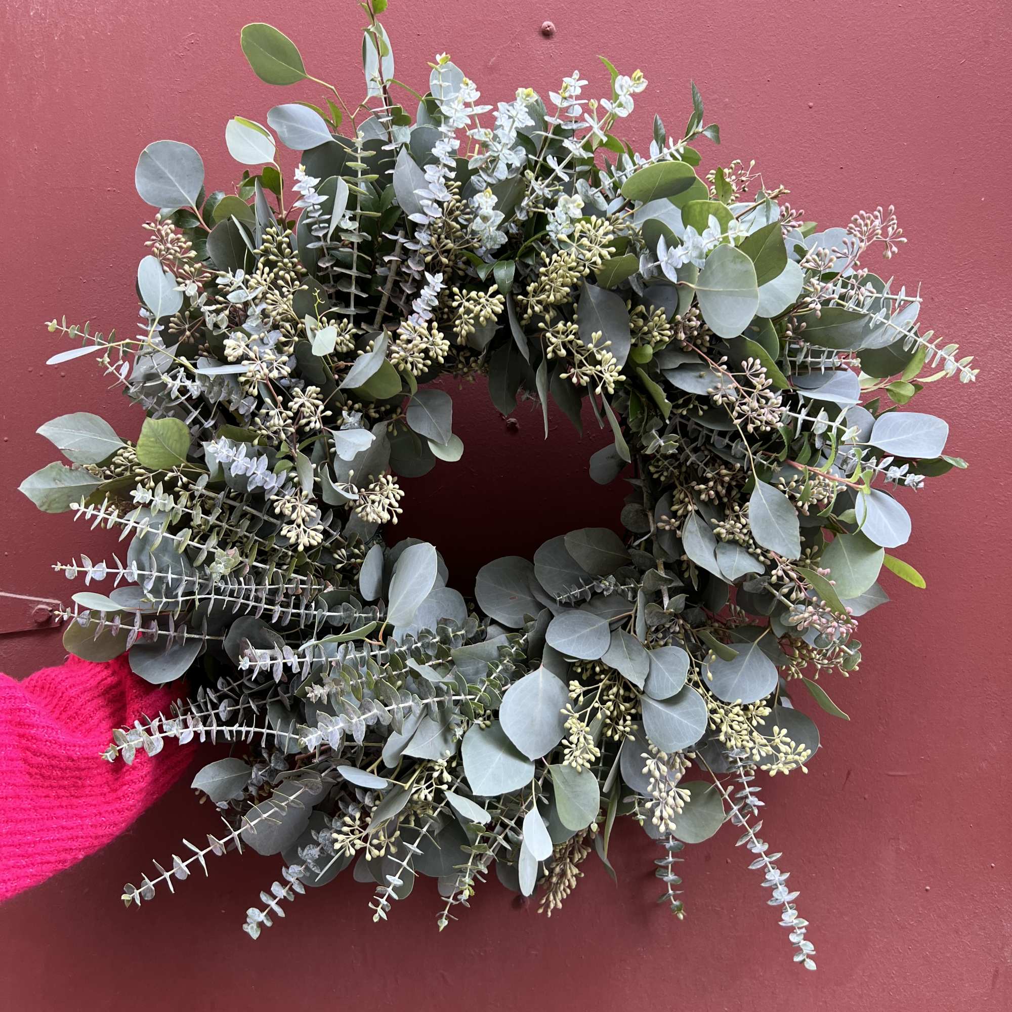 Celebrate the season with a beautiful hand made wreath full of eucalyptus.