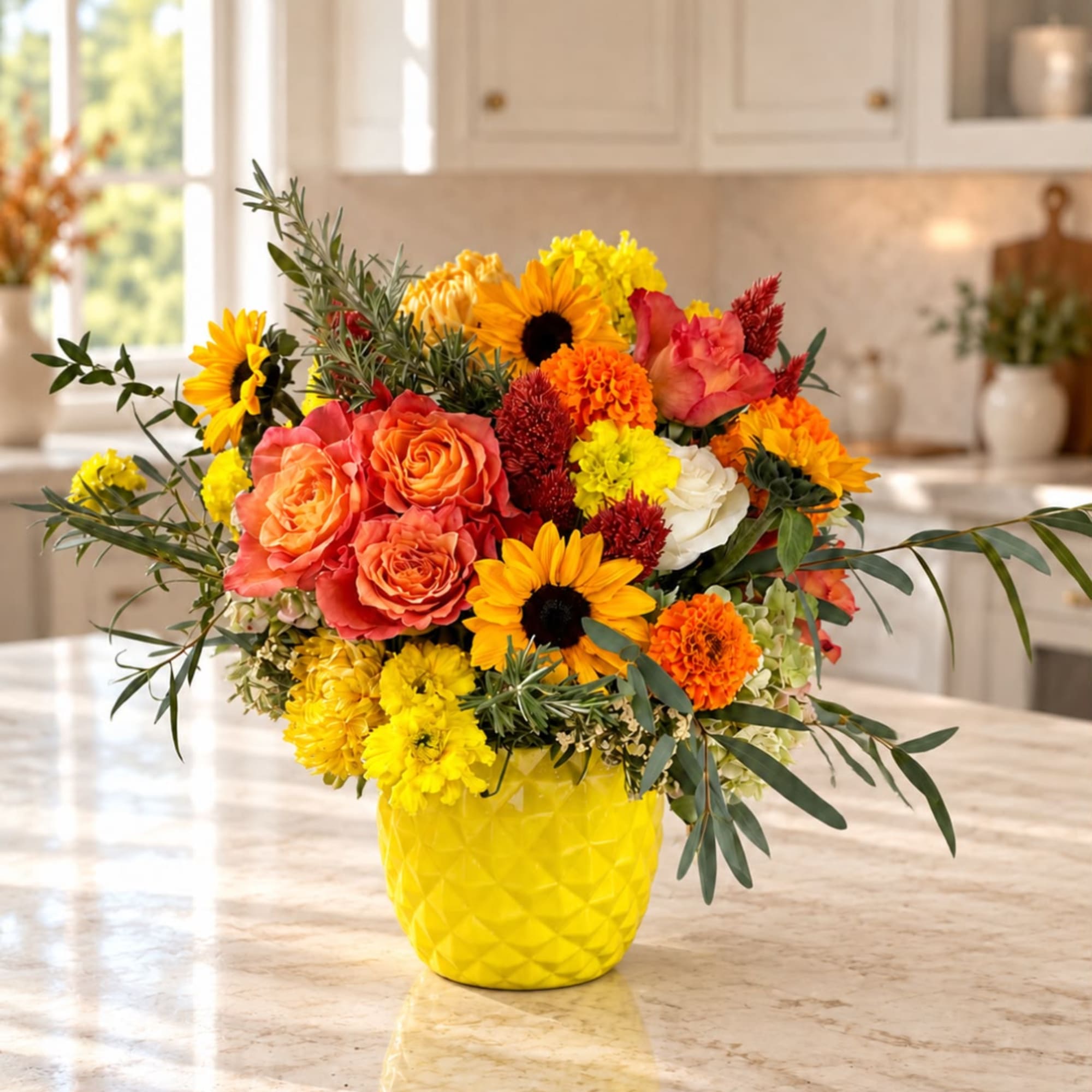 Bright mixed bouquet in a yellow vase with sunflowers and roses
