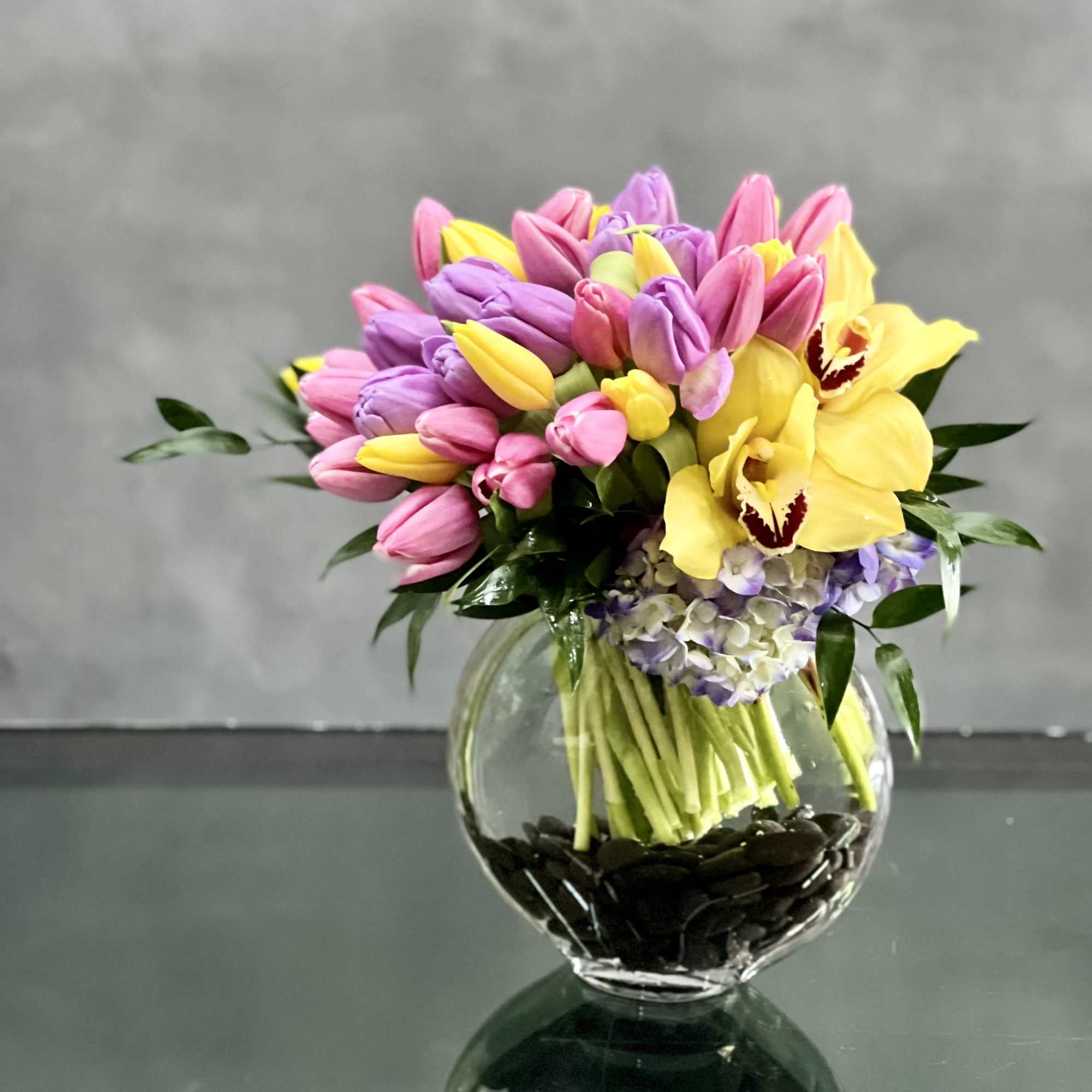 Here's a spring-tastic way to brighten someone's day: a glass vase of, photo 3 of 3