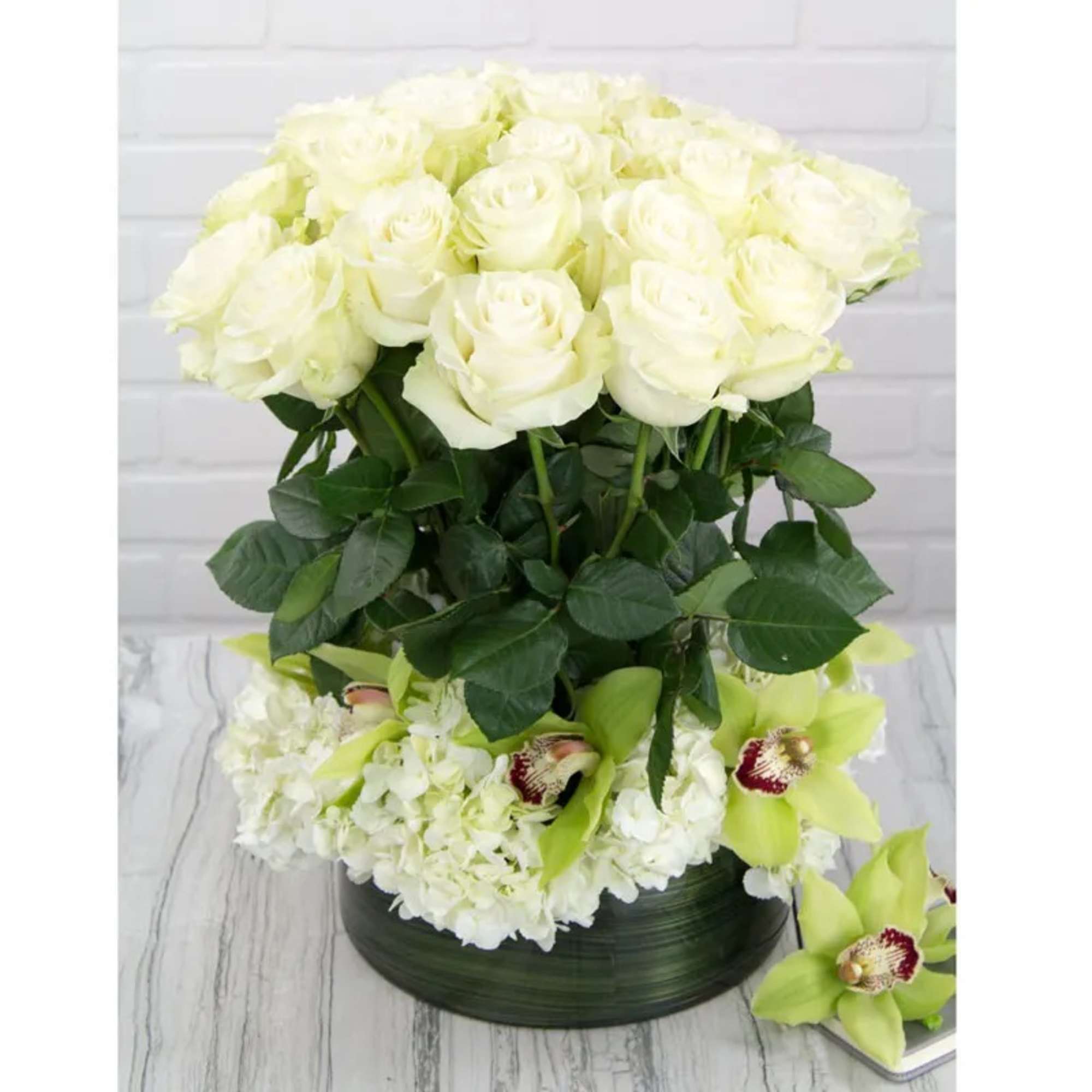 This definitely has the "WOW" factor. Absolutely gorgeous tall White Roses are