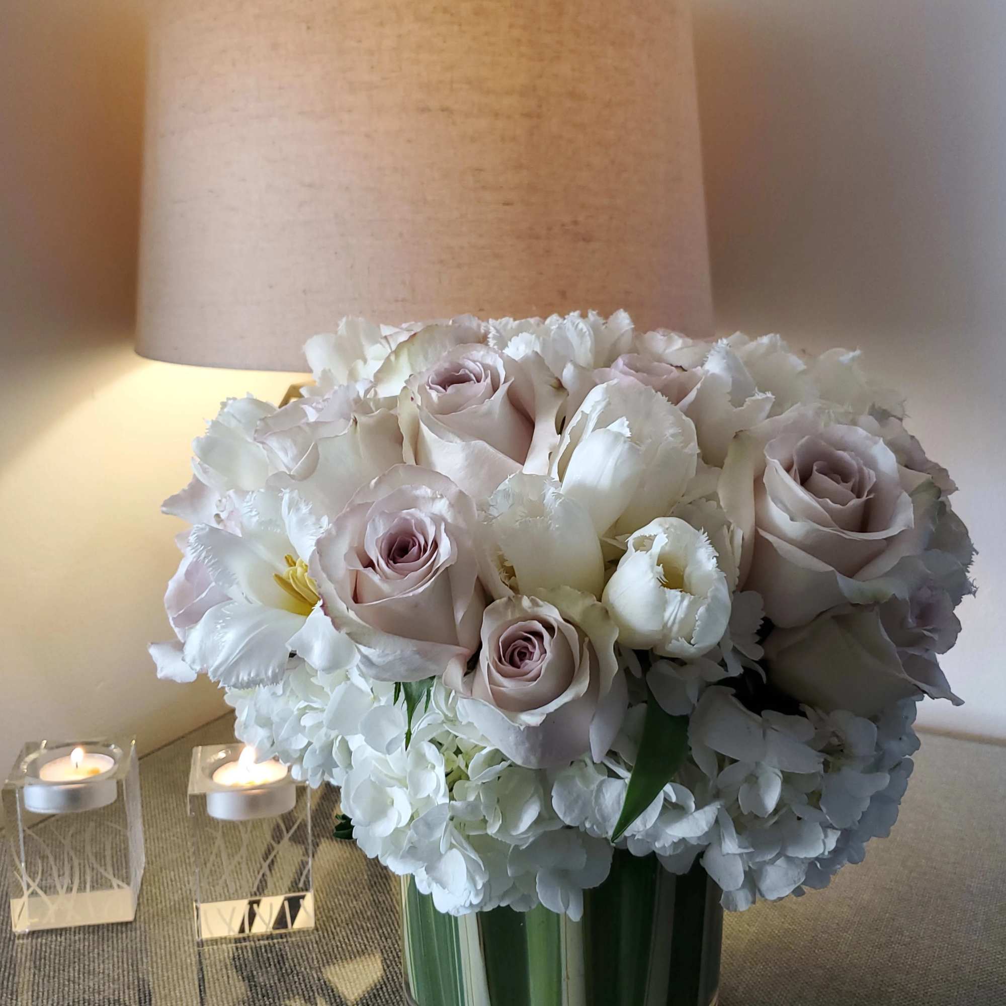 Cream Roses and white tulips in a glass vase accented with some, photo 2 of 2