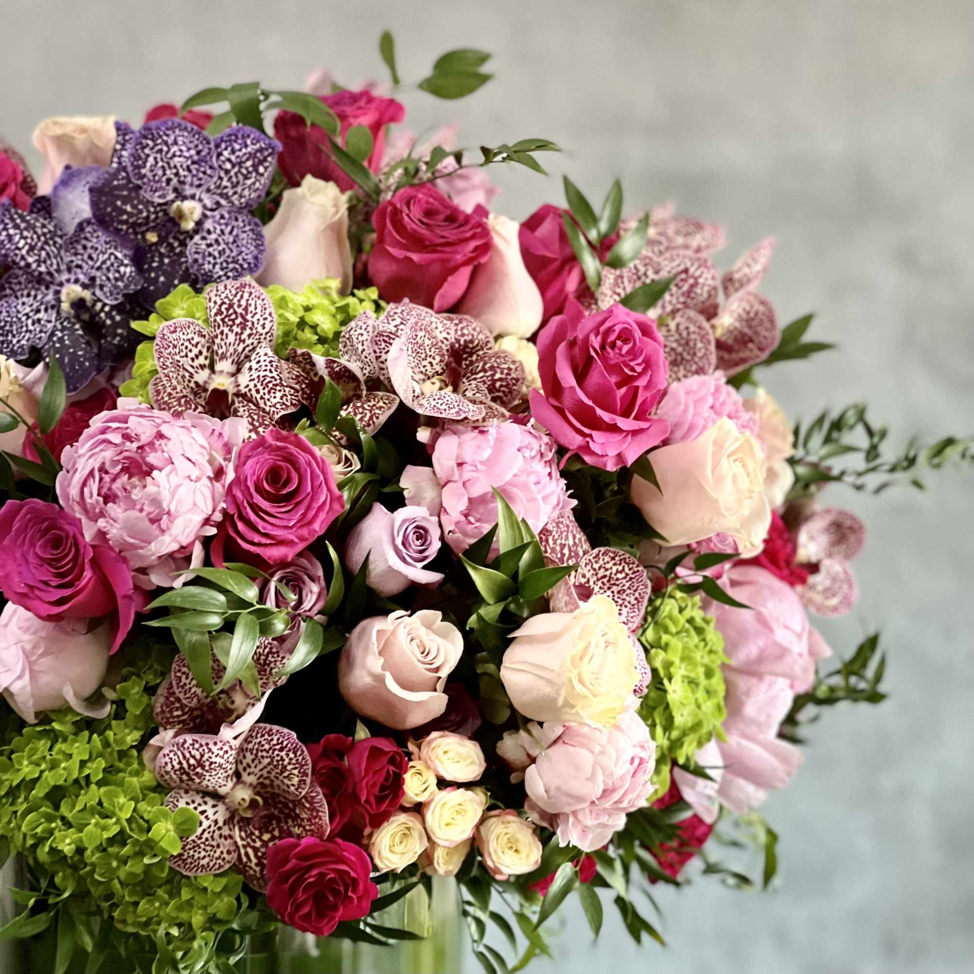 Pastels and vivid bright florals are featured in this sophisticated design. Lovely, photo 4 of 4