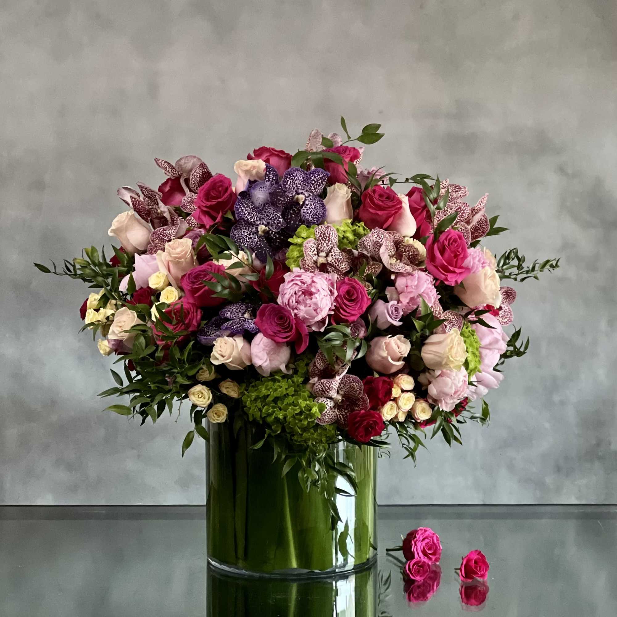 Pastels and vivid bright florals are featured in this sophisticated design. Lovely, photo 2 of 4