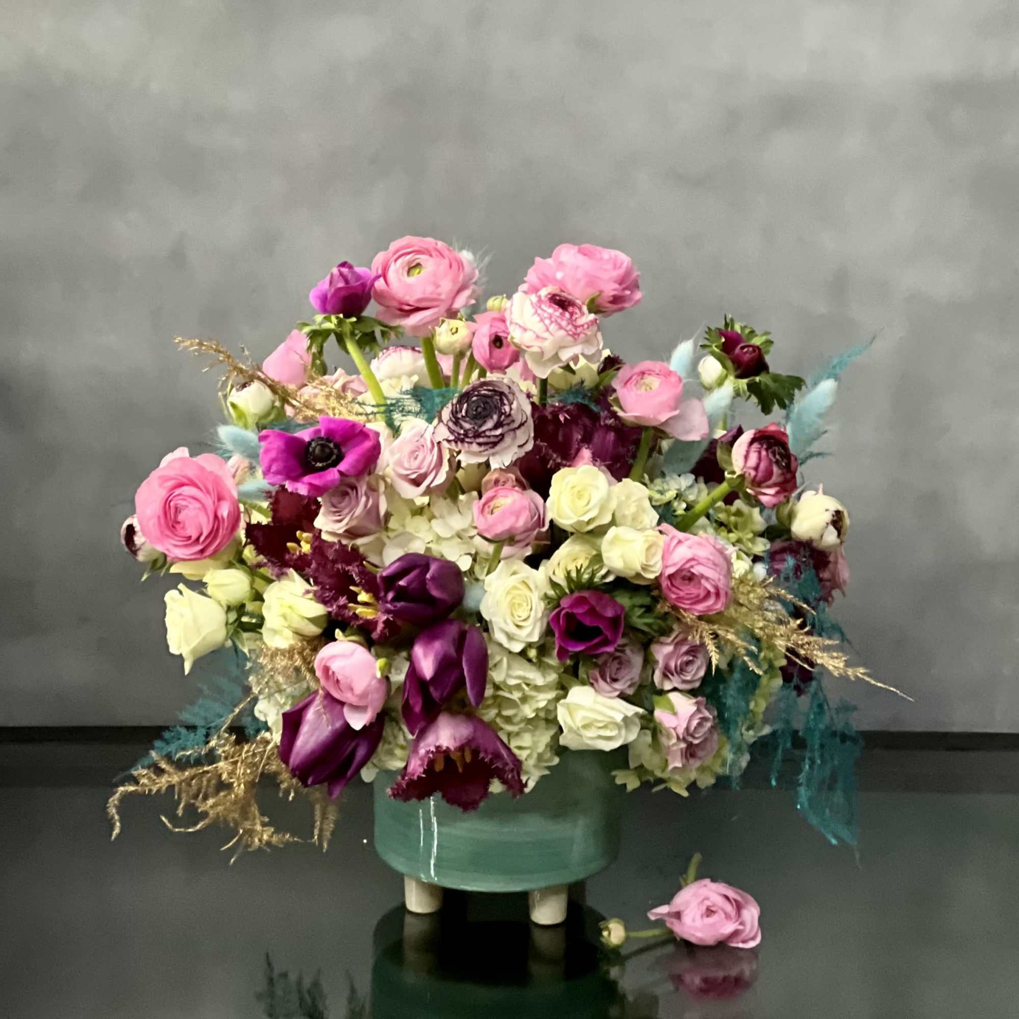 A Verity of Roses , Rananculus in a Turquoise Ceramic Vase. Perfect