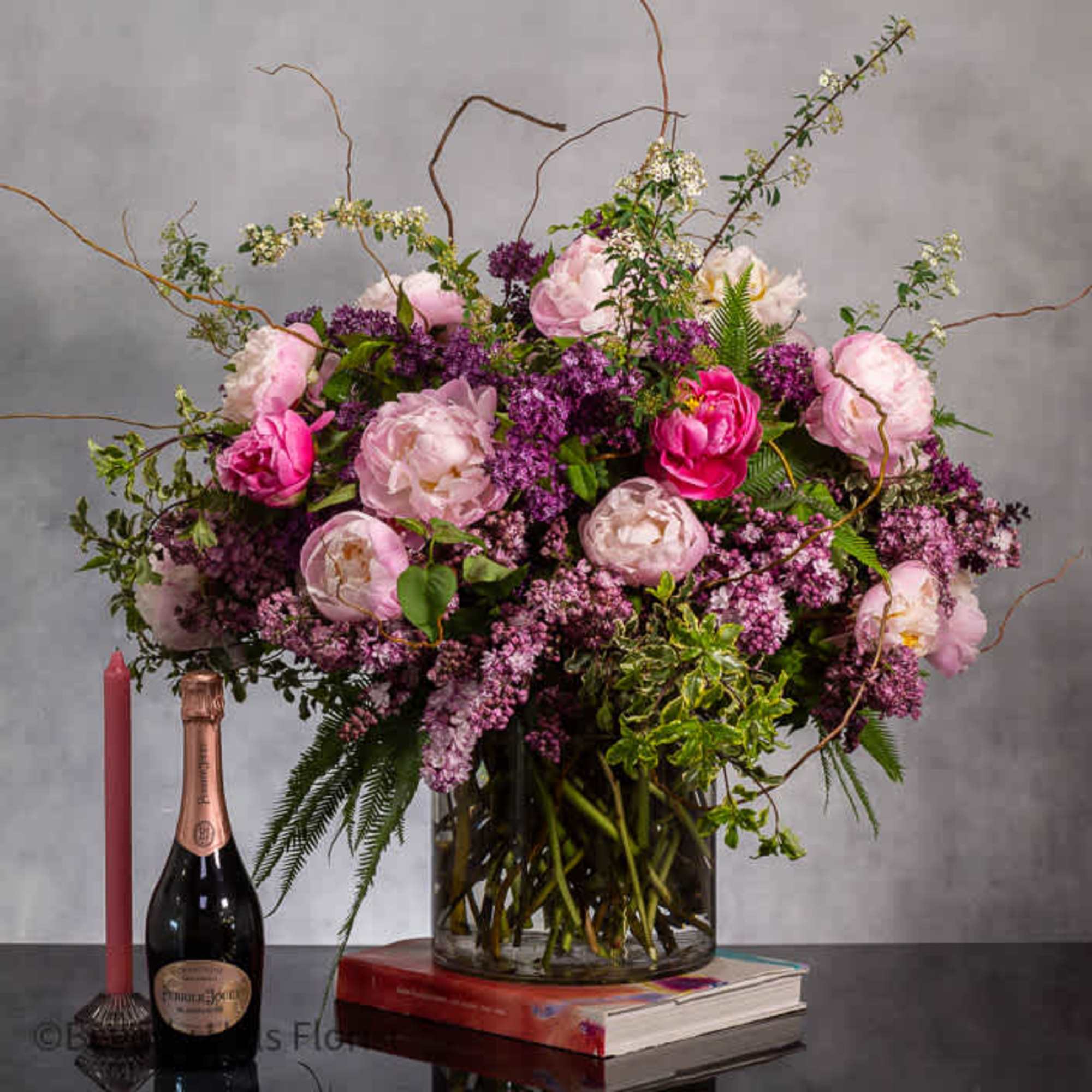 Step into a realm of enchantment with our spectacular floral masterpiece, the