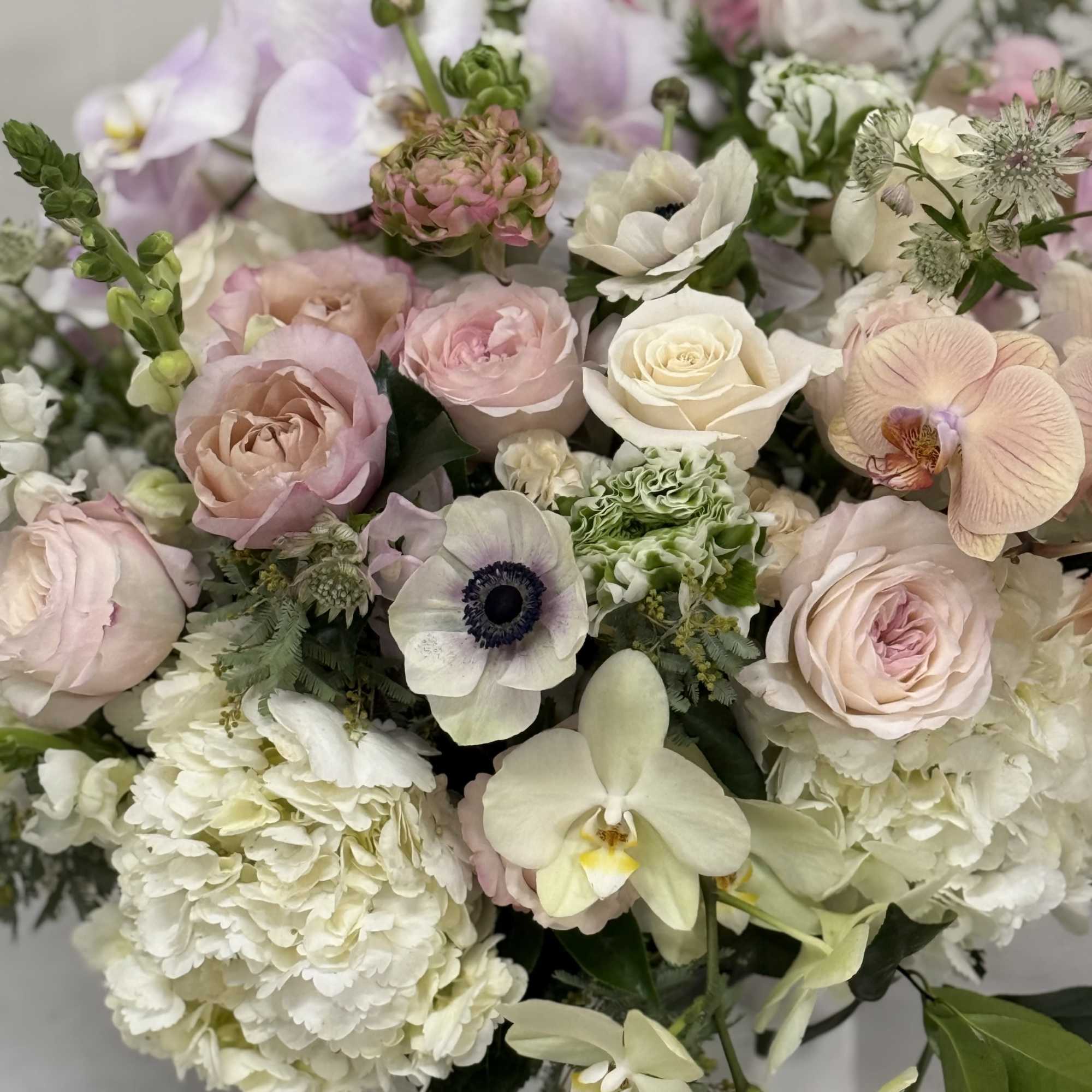 An English garden design of premium flowers focusing on a blush, peach, photo 2 of 7