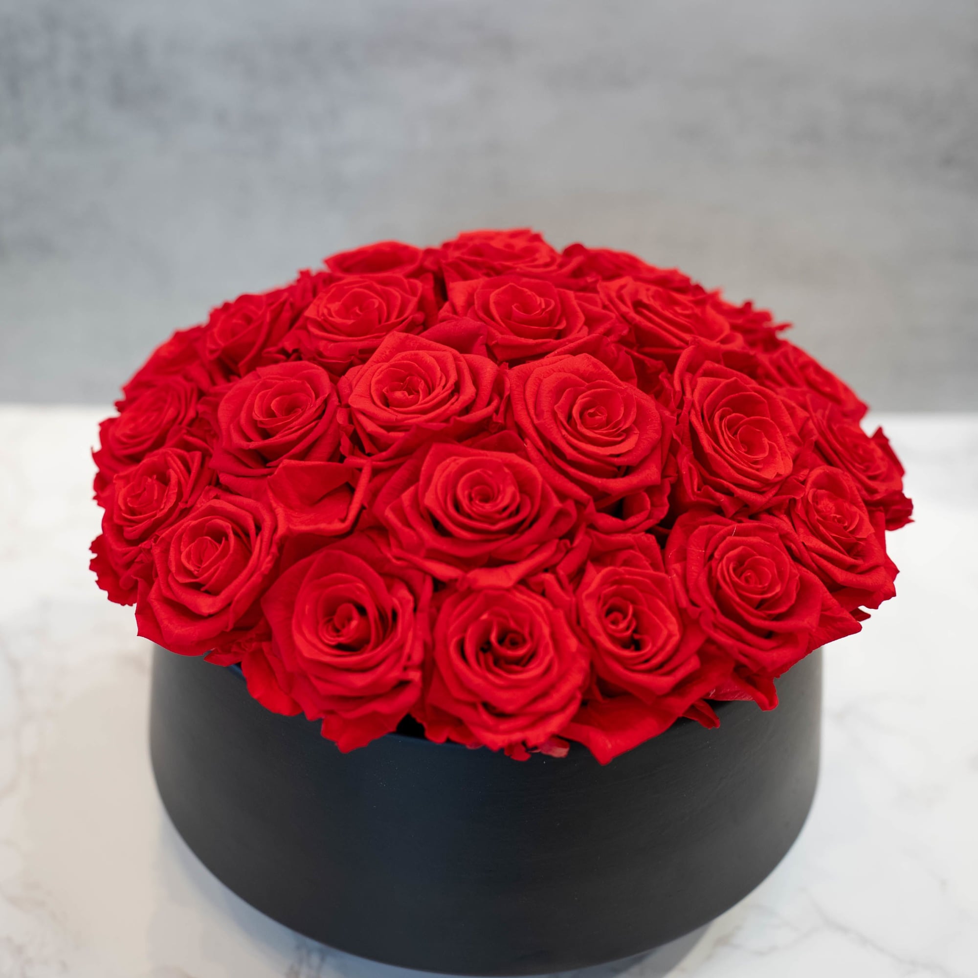 High end preserved roses, custom designed by hand in our local shop