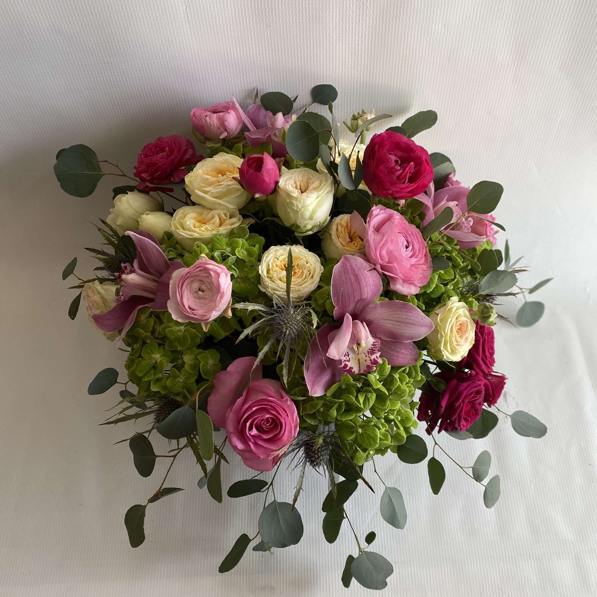 Experience a burst of vibrant colors with our stunning flower arrangement, featuring, photo 2 of 2