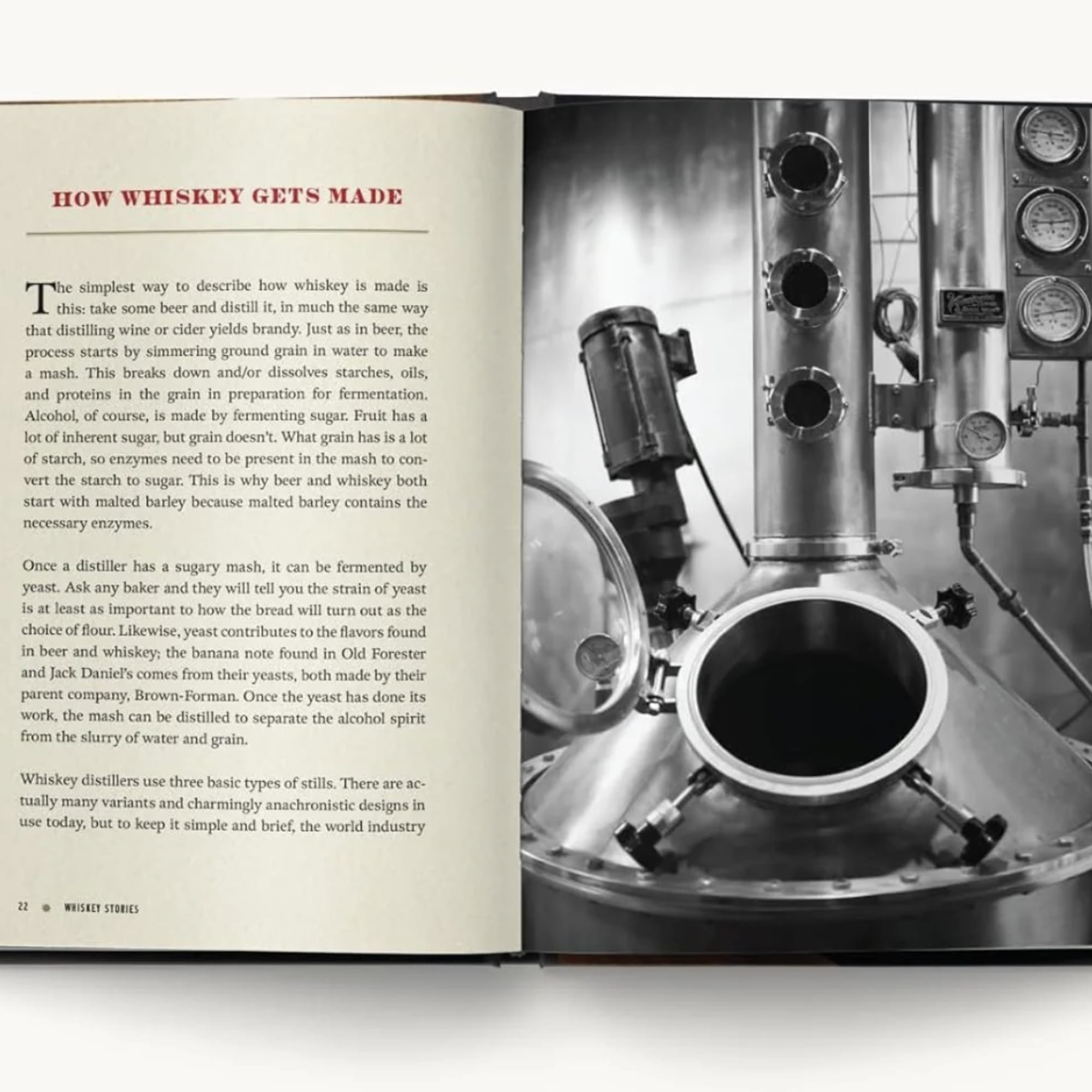 Open book showing a page about whiskey making beside a photo of distilling equipment.