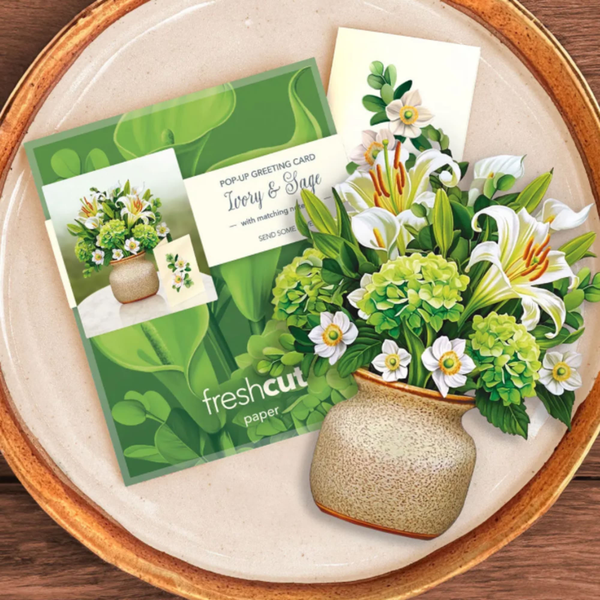 Pop-up greeting card with a green floral bouquet and vase