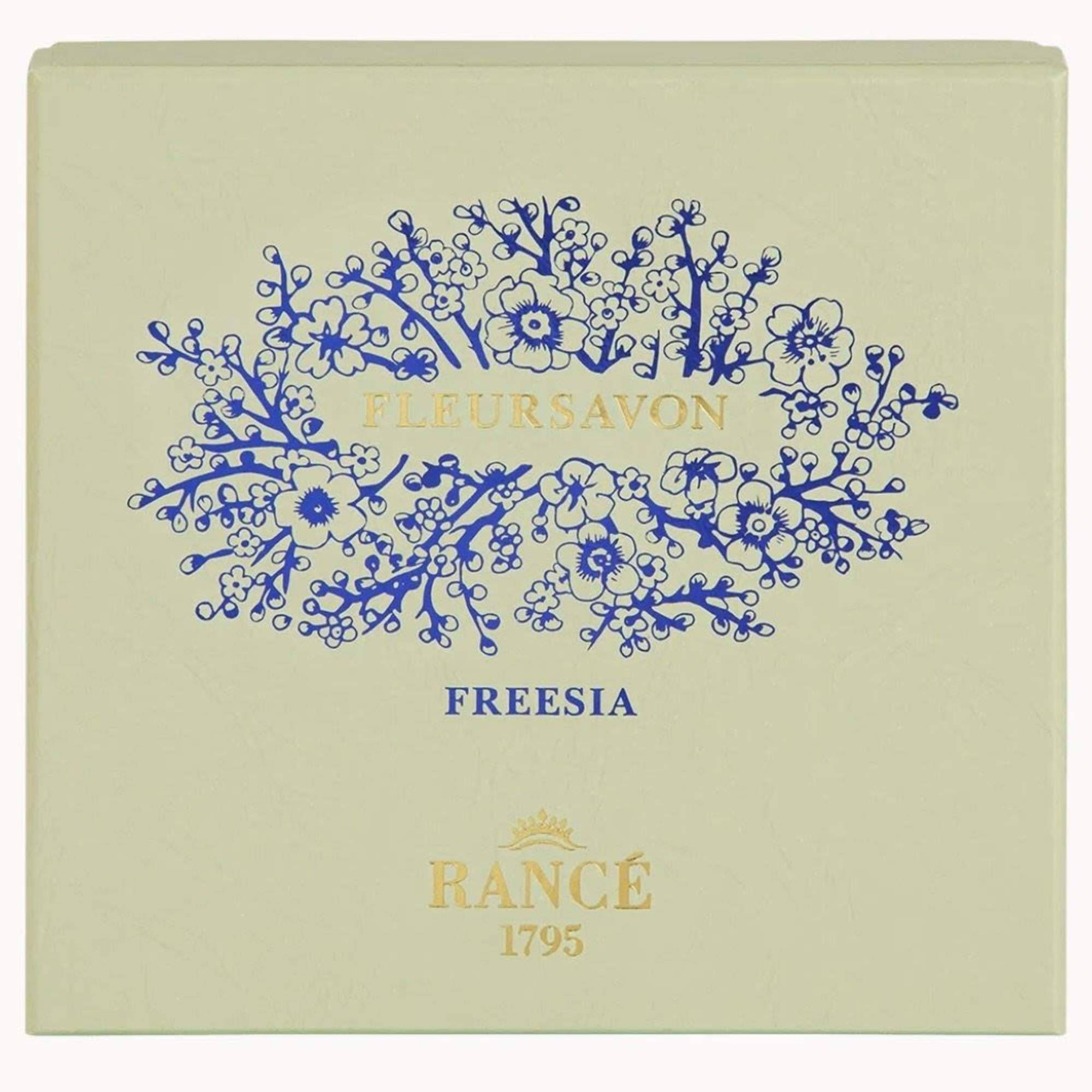 Cream box with blue floral illustration and the word Freesia