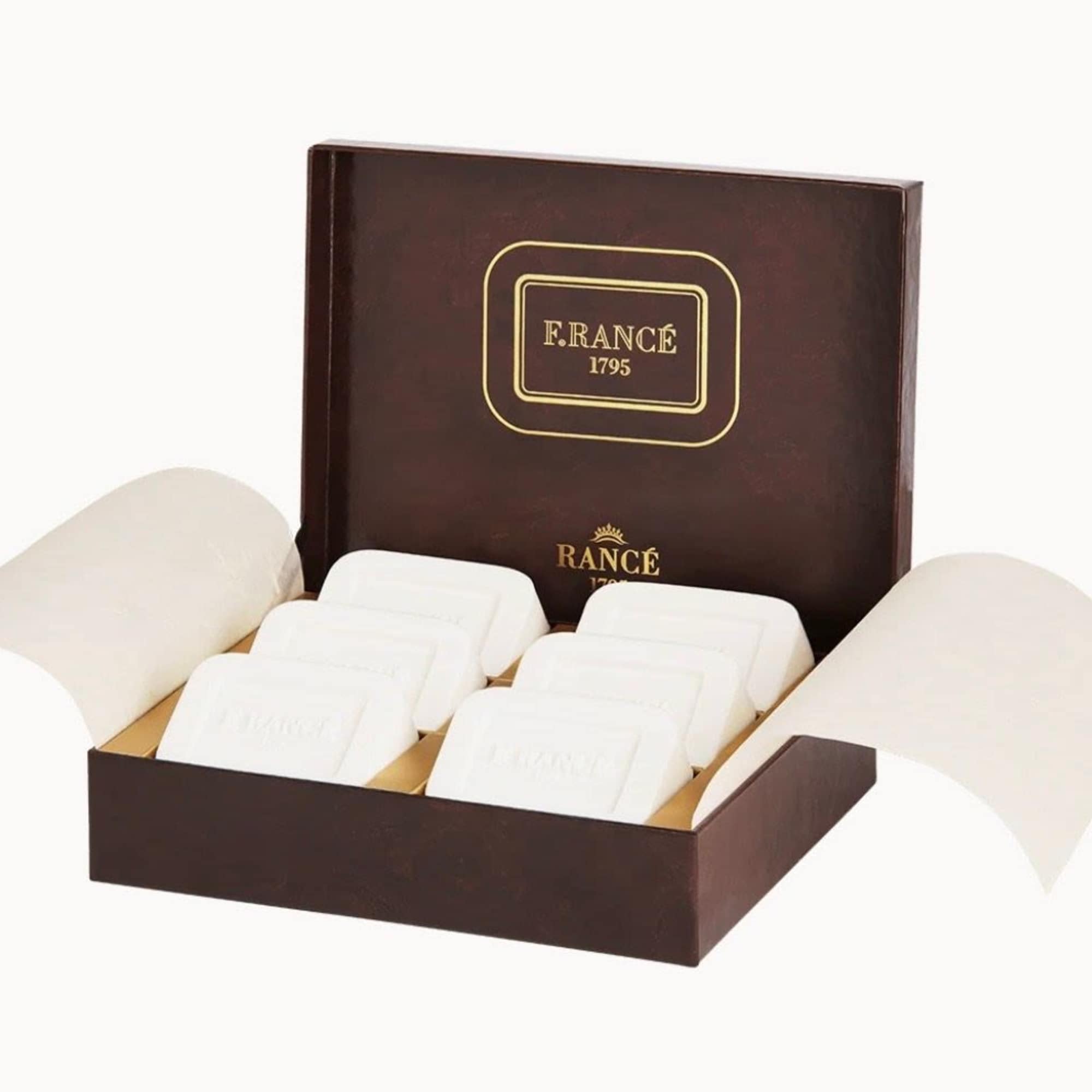 Box of white wrapped chocolates in a brown gift box