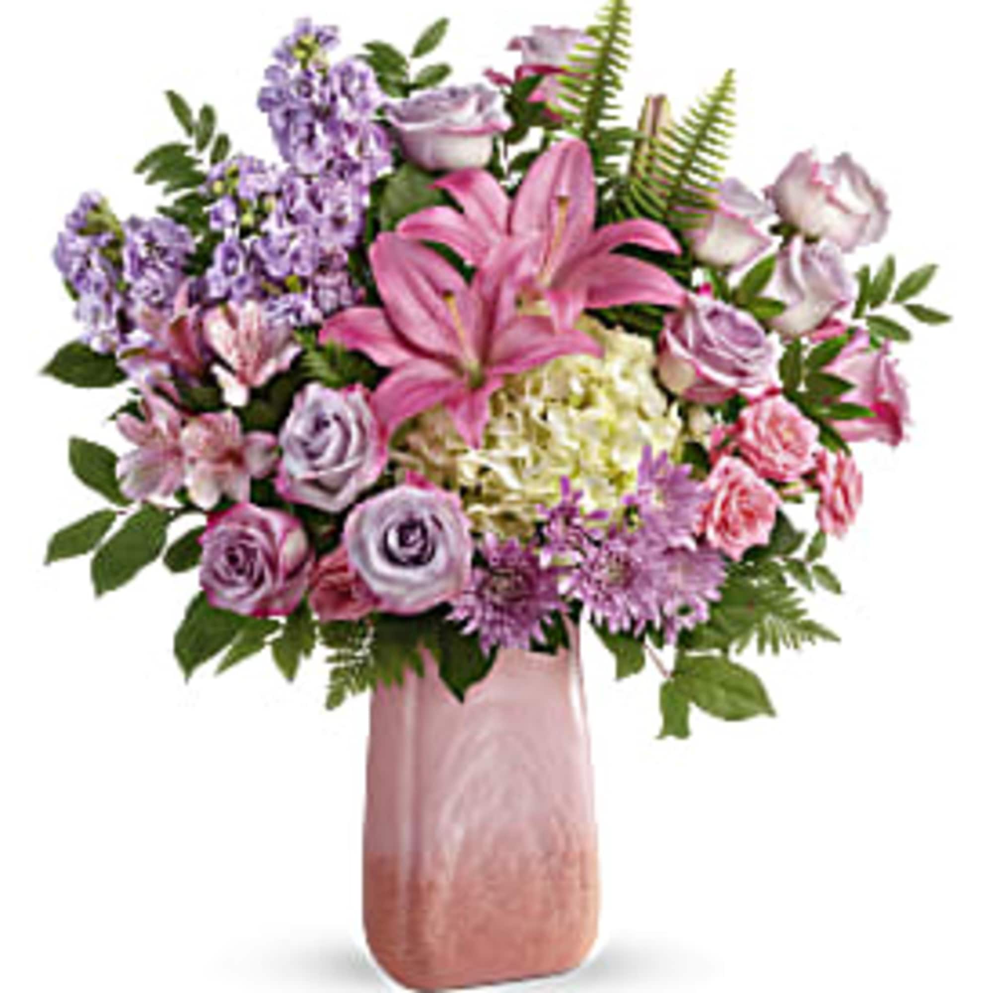 Pink and lavender bouquet in a tall pink vase