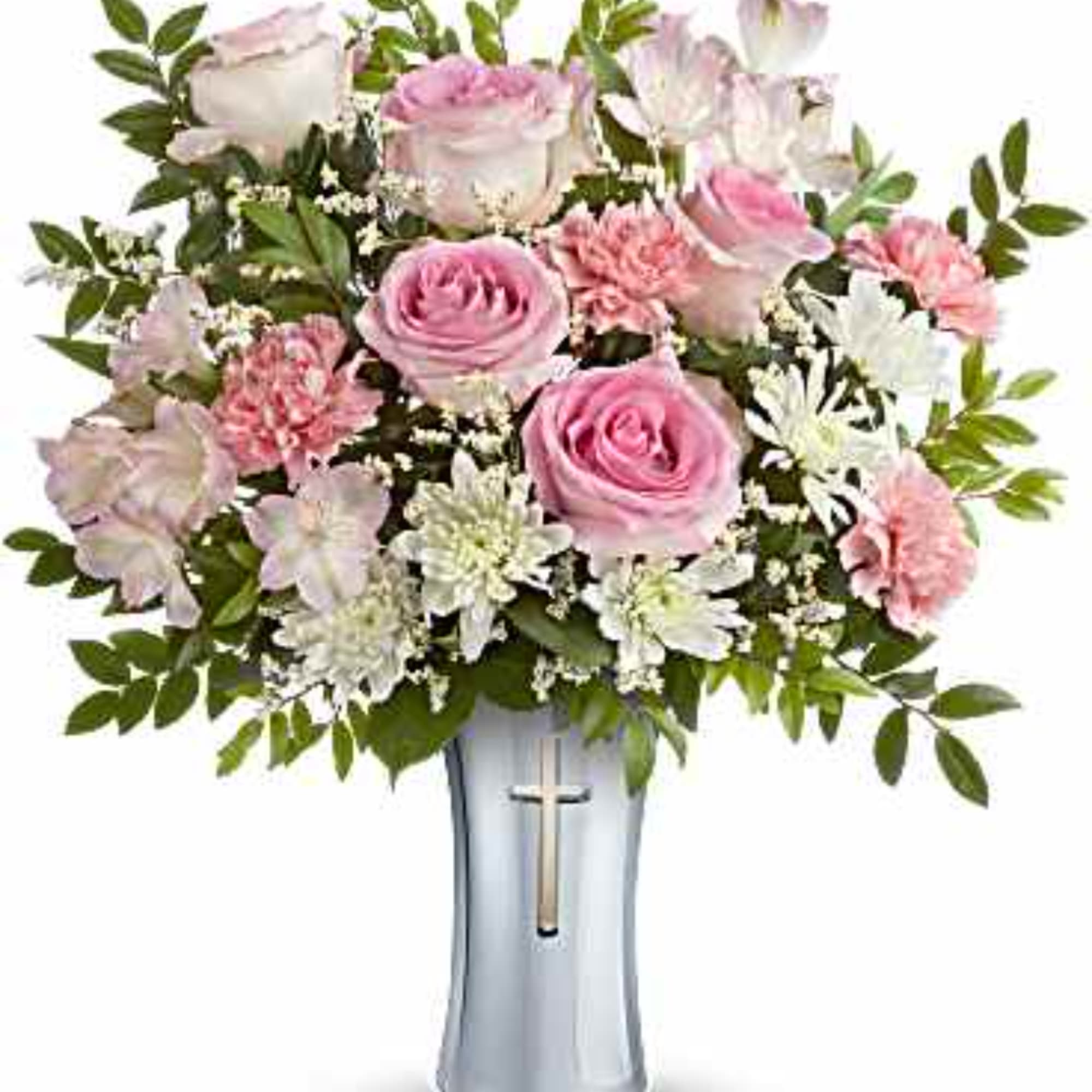 Pink roses and white flowers arranged in a silver vase with a cross