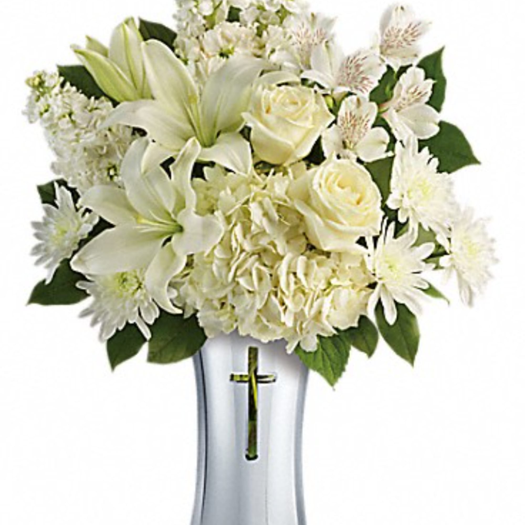 White lilies, roses, and daisies arranged in a tall glass vase