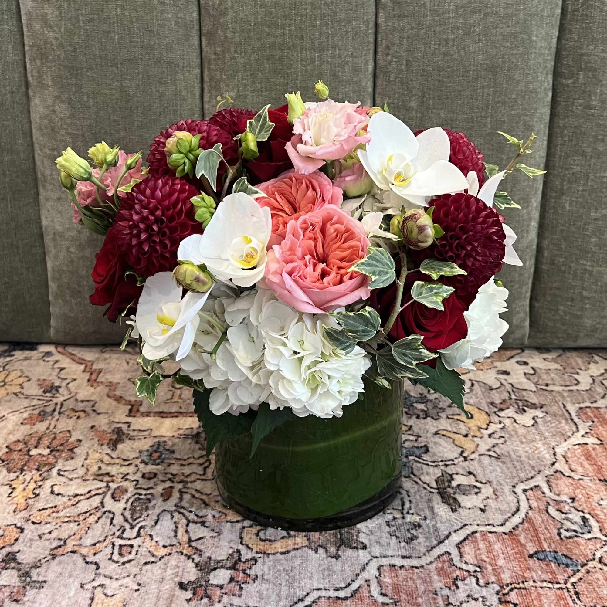 A lush, jewel-toned rounded arrangement designed to make her feel truly celebrated-perfect