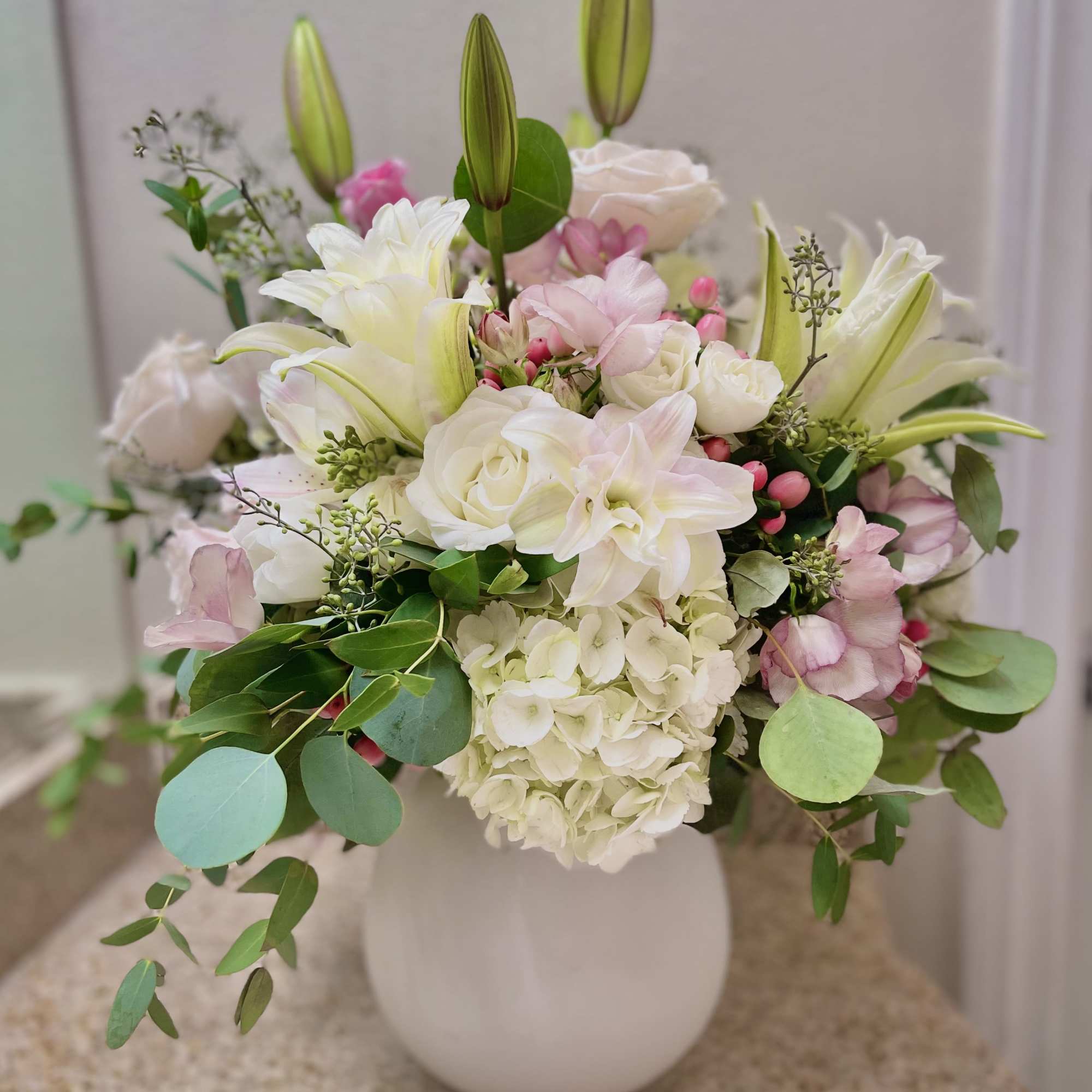  A gorgeous mix of soft pastel and white flowers in a