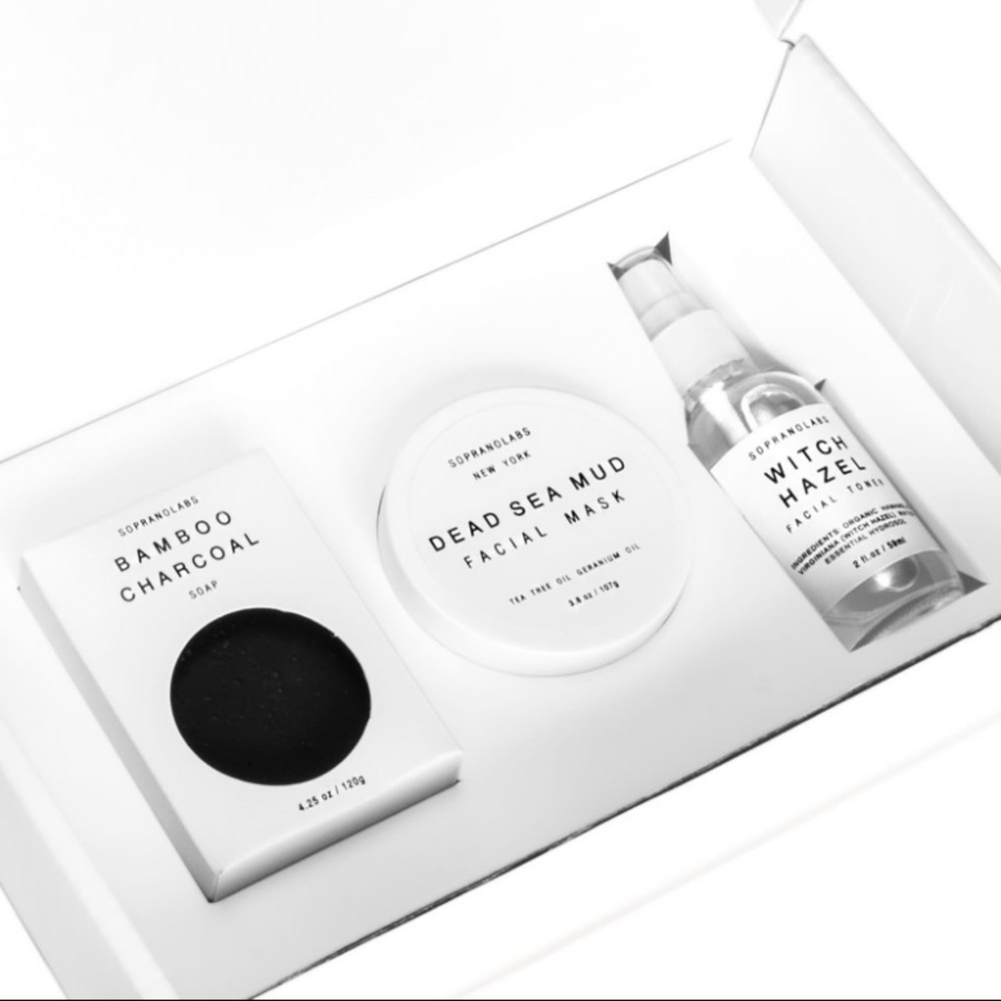 Gift box with soap, facial mask, and toner bottles