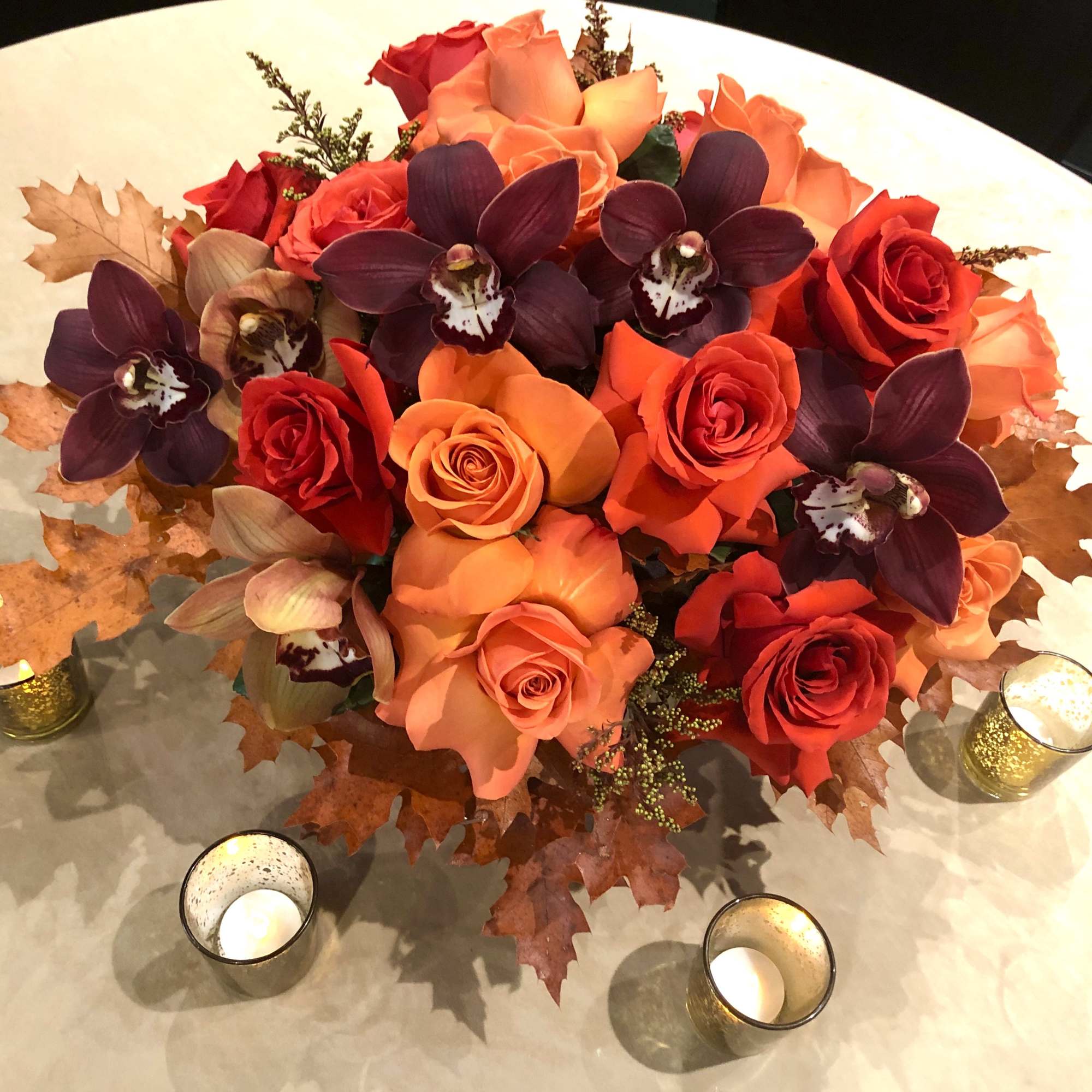 This low and lush arrangement is the PERFECT centerpiece for your festivities