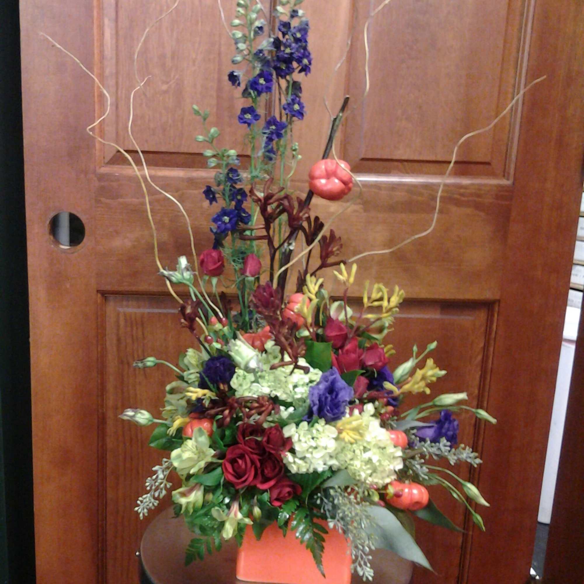 With a mixture of roses, asters, other flowers along with some bling, photo 2 of 24
