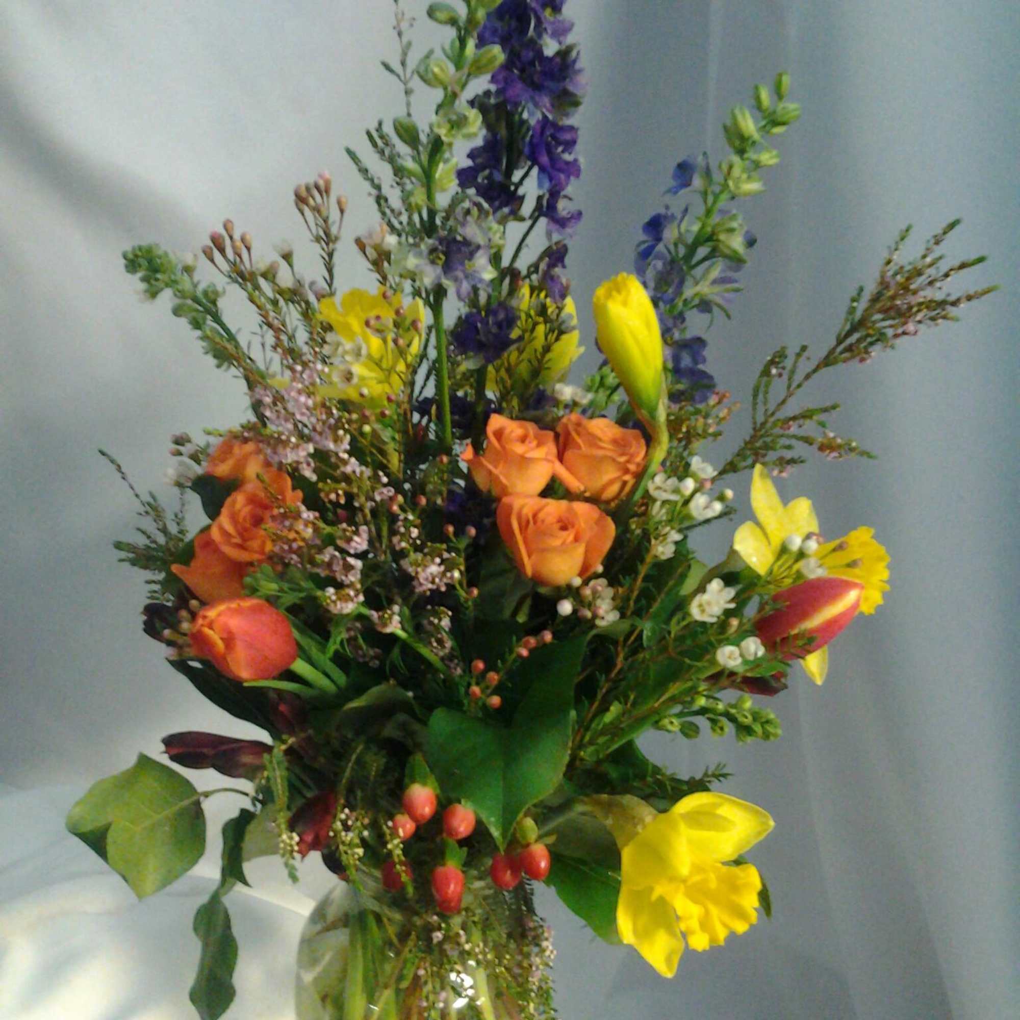 With a mixture of roses, asters, other flowers along with some bling, photo 5 of 24