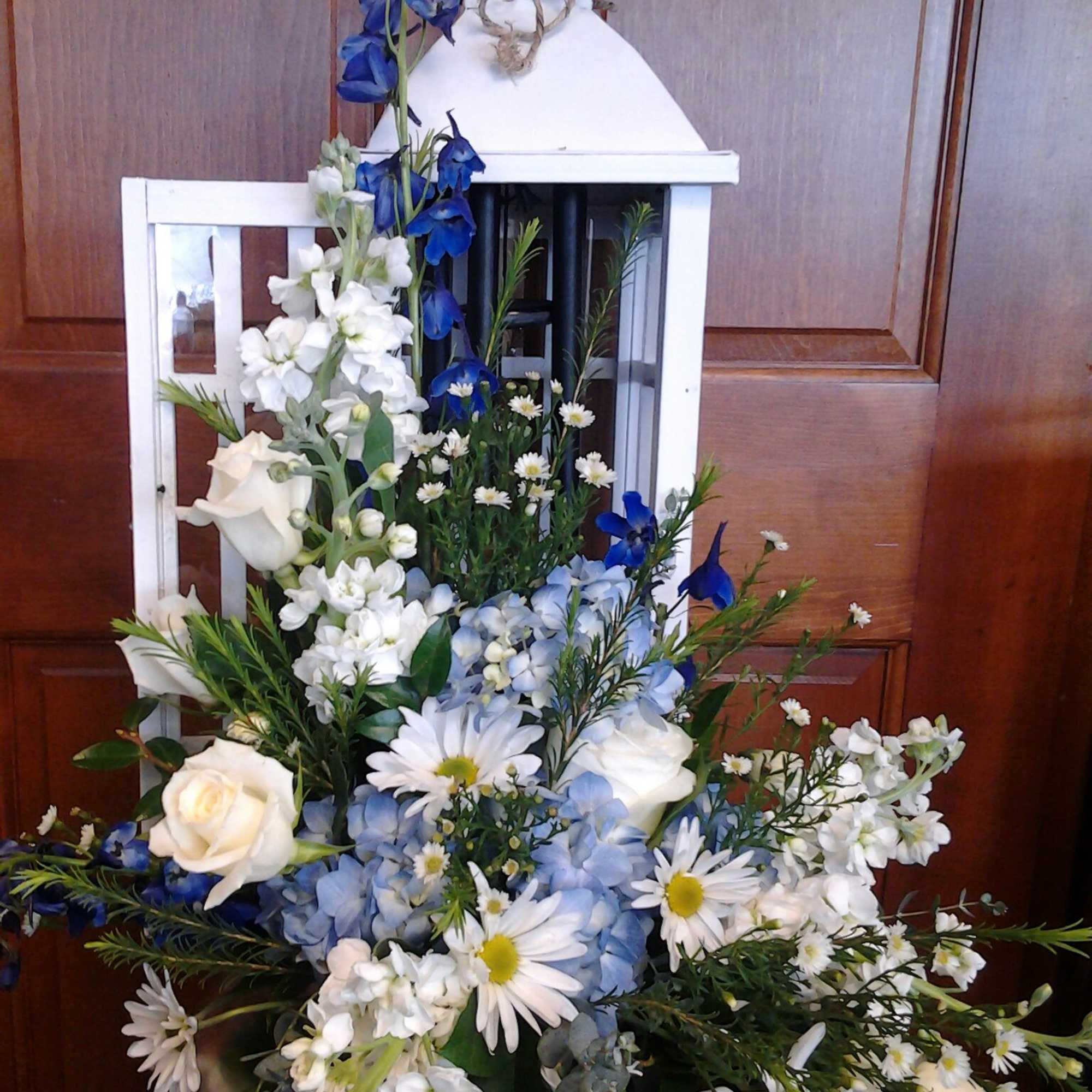 With a mixture of roses, asters, other flowers along with some bling, photo 16 of 24