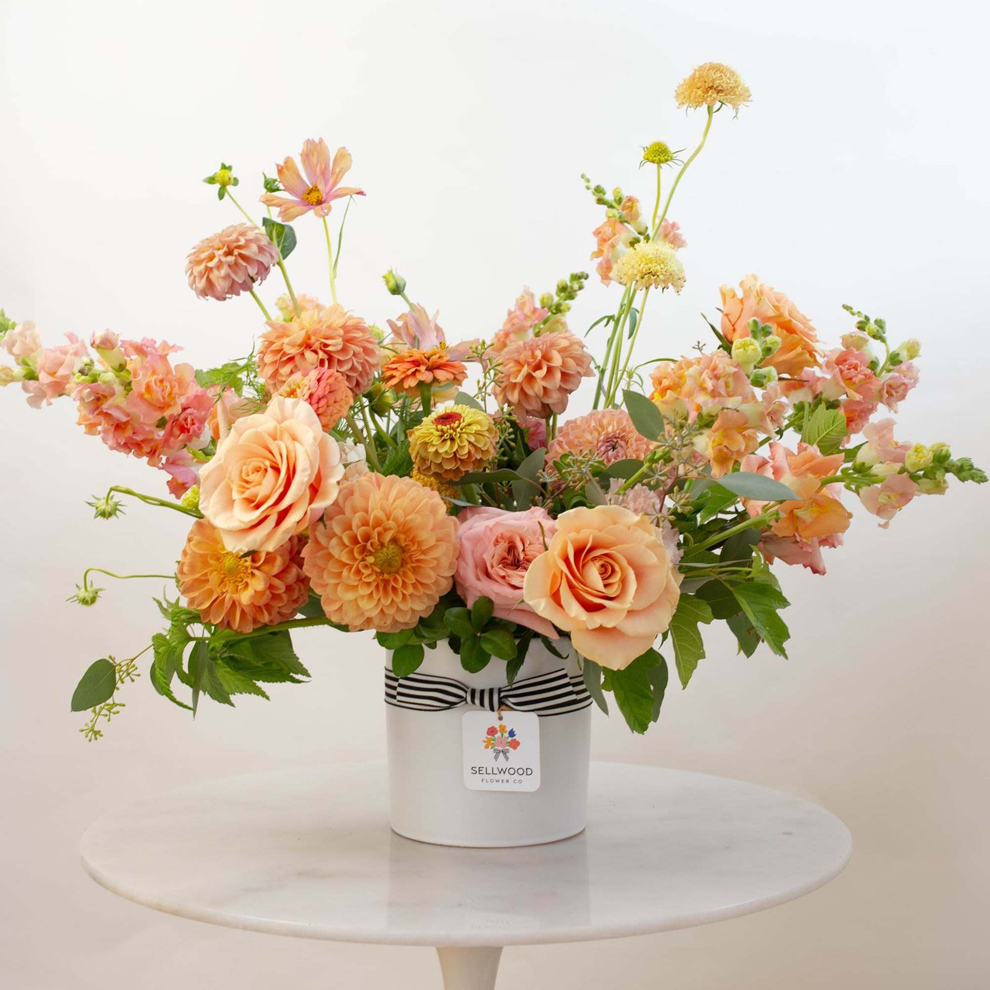 Inspired by the colors of golden hour, this arrangement captures the warmth