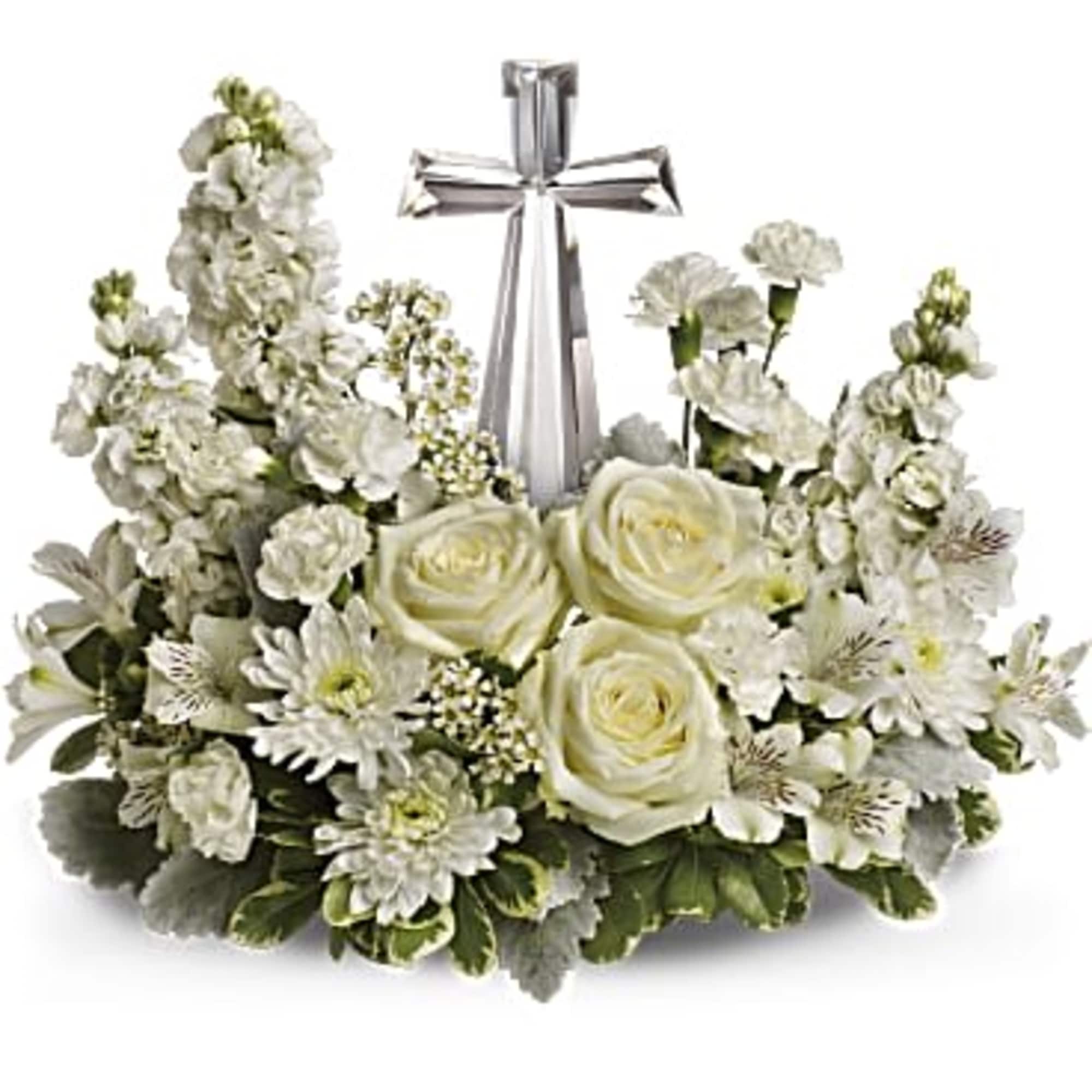 White floral arrangement with a silver cross centerpiece