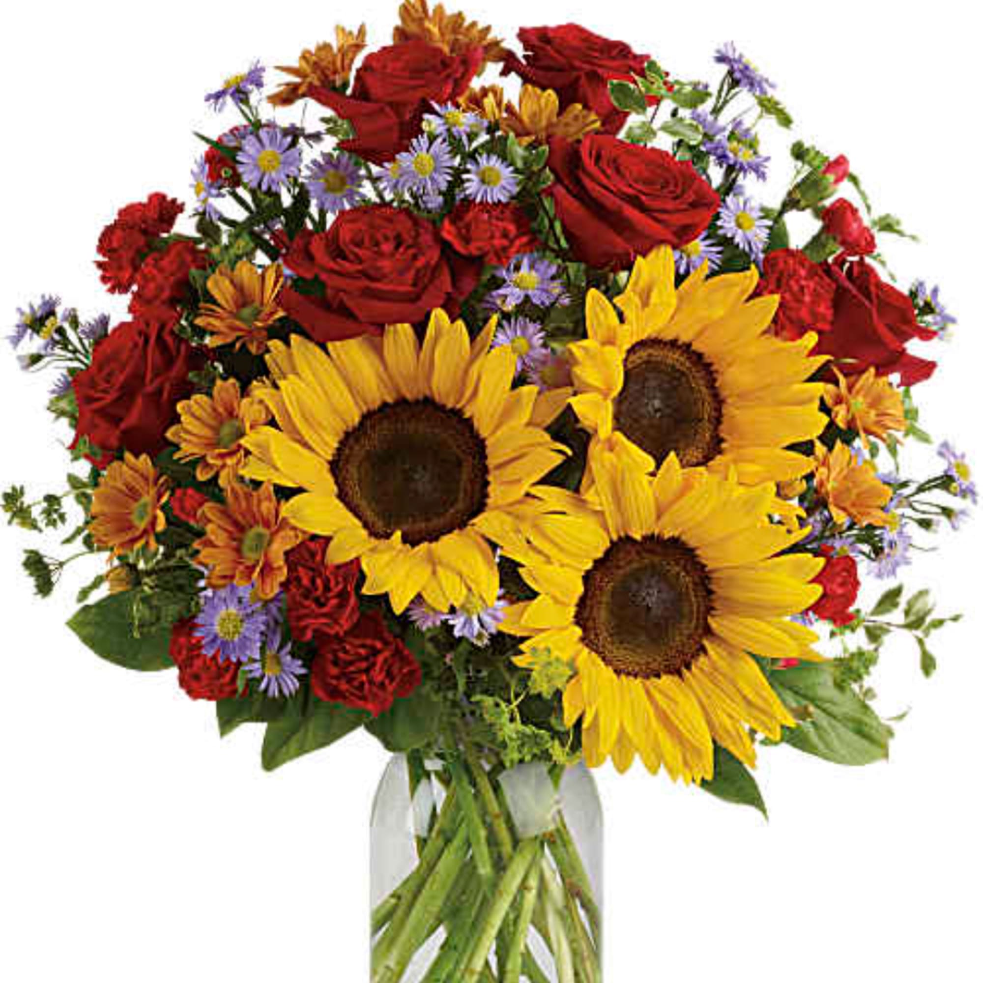 Bouquet of sunflowers, red roses, and purple daisies in a glass vase