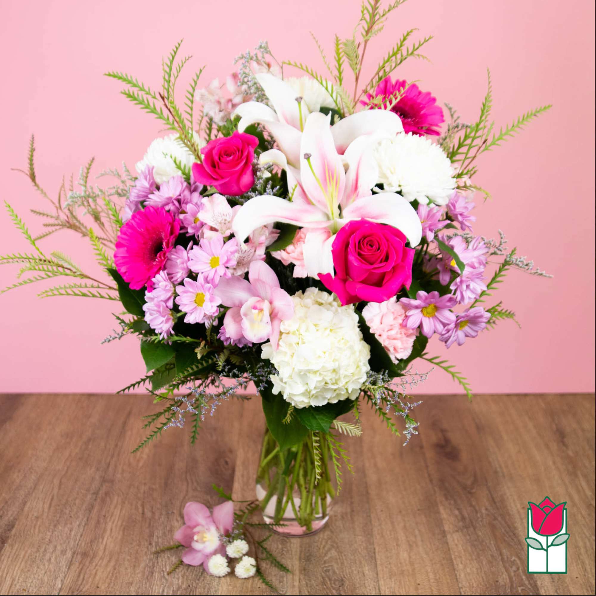 Pink and white mixed bouquet in a clear glass vase
