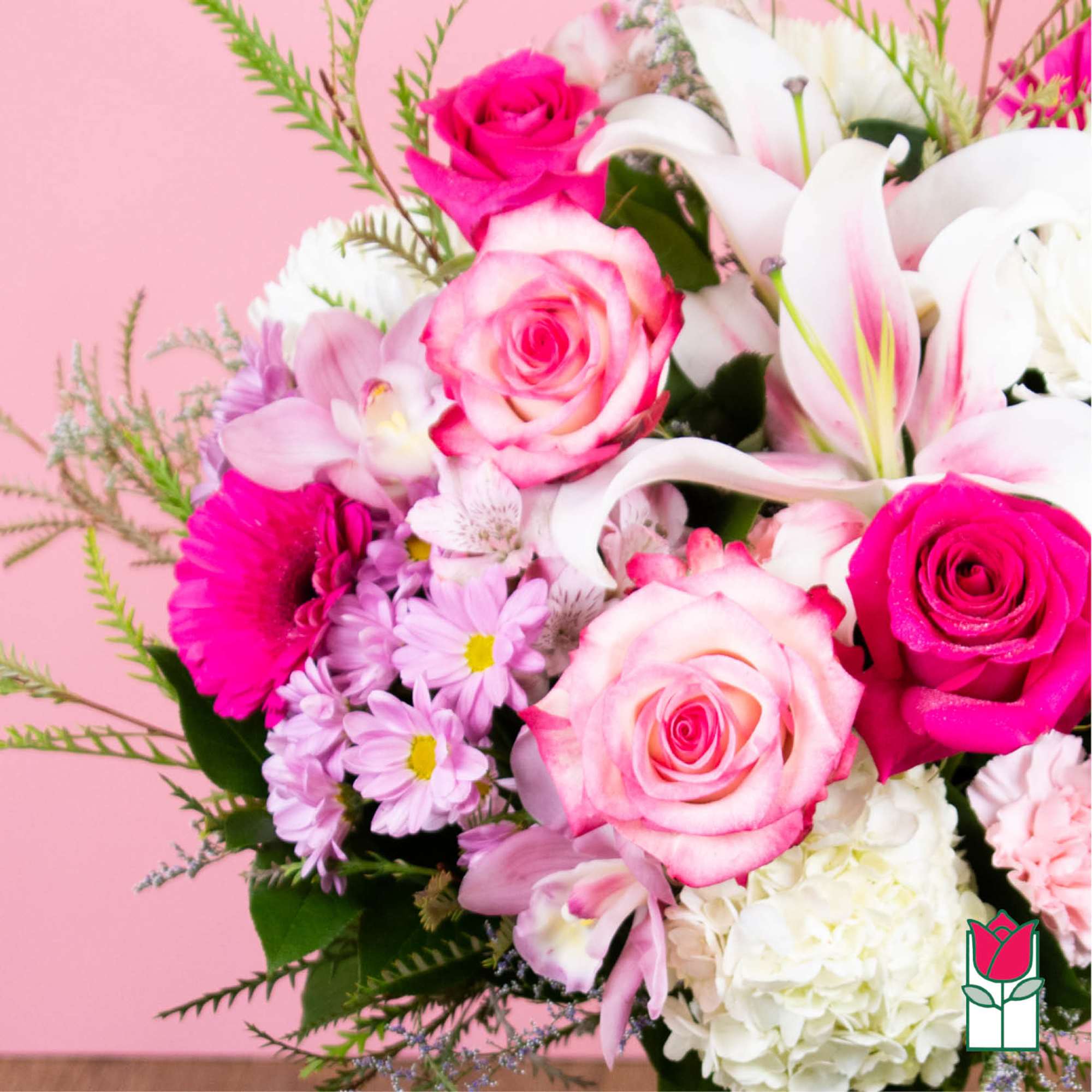 Pink and white bouquet with roses, lilies, and hydrangea