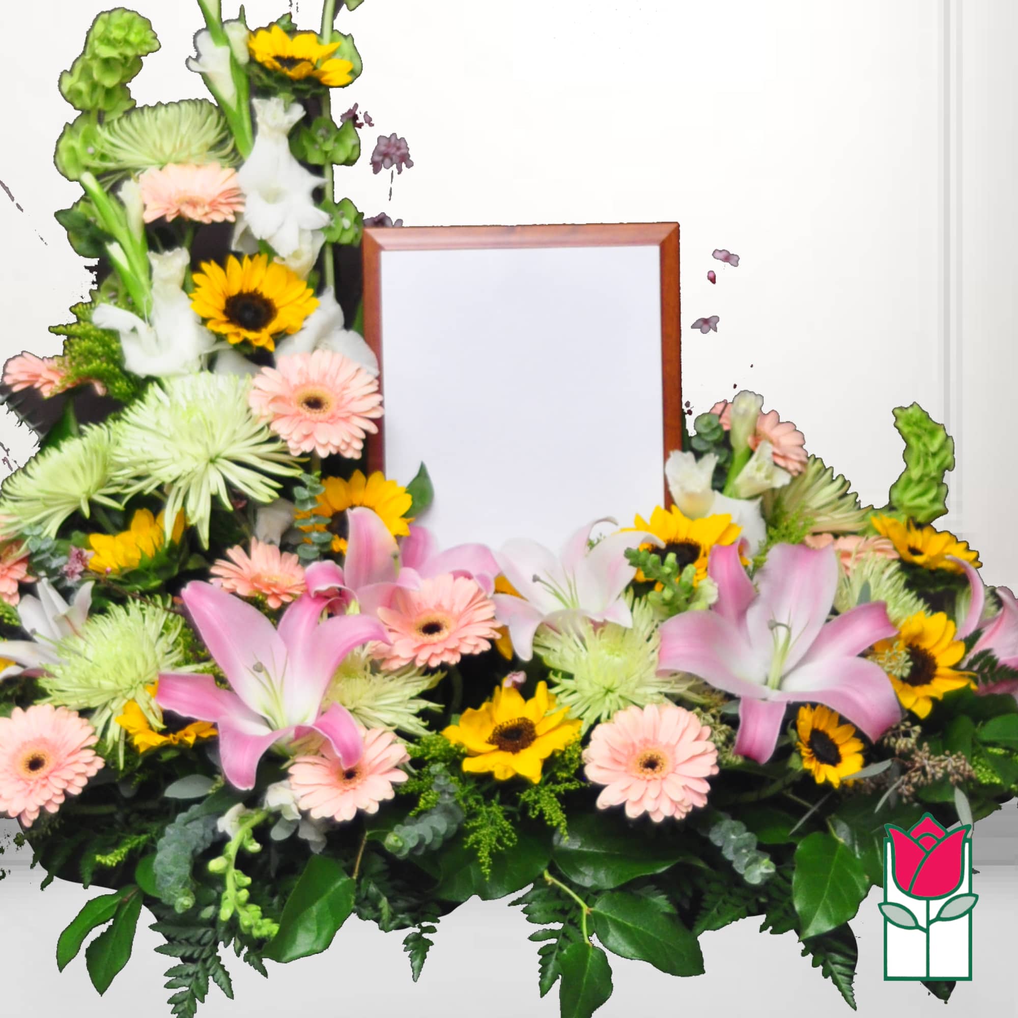 Floral frame with pink lilies, sunflowers, and gerbera daisies around a blank center panel