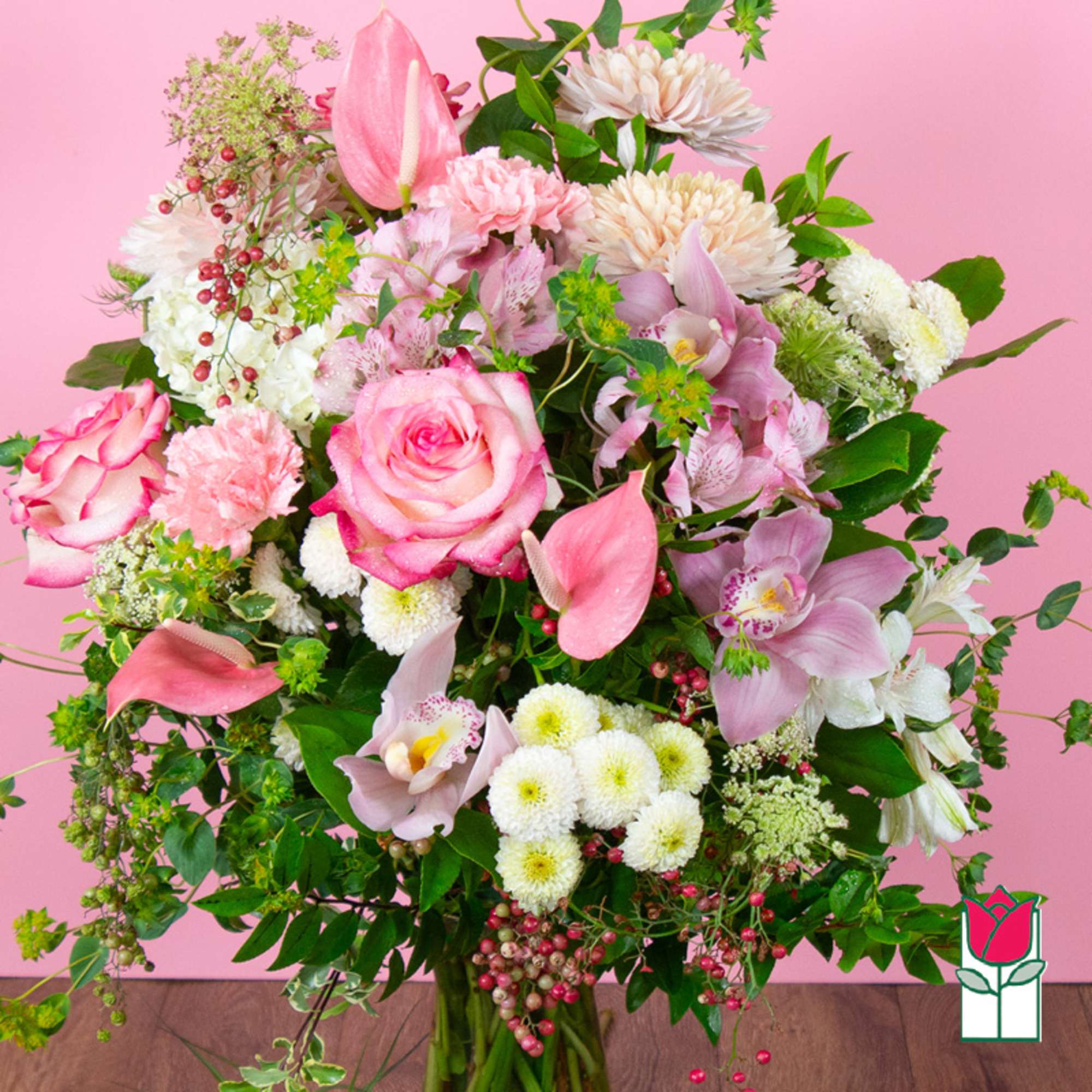 Pink and white mixed bouquet in a glass vase