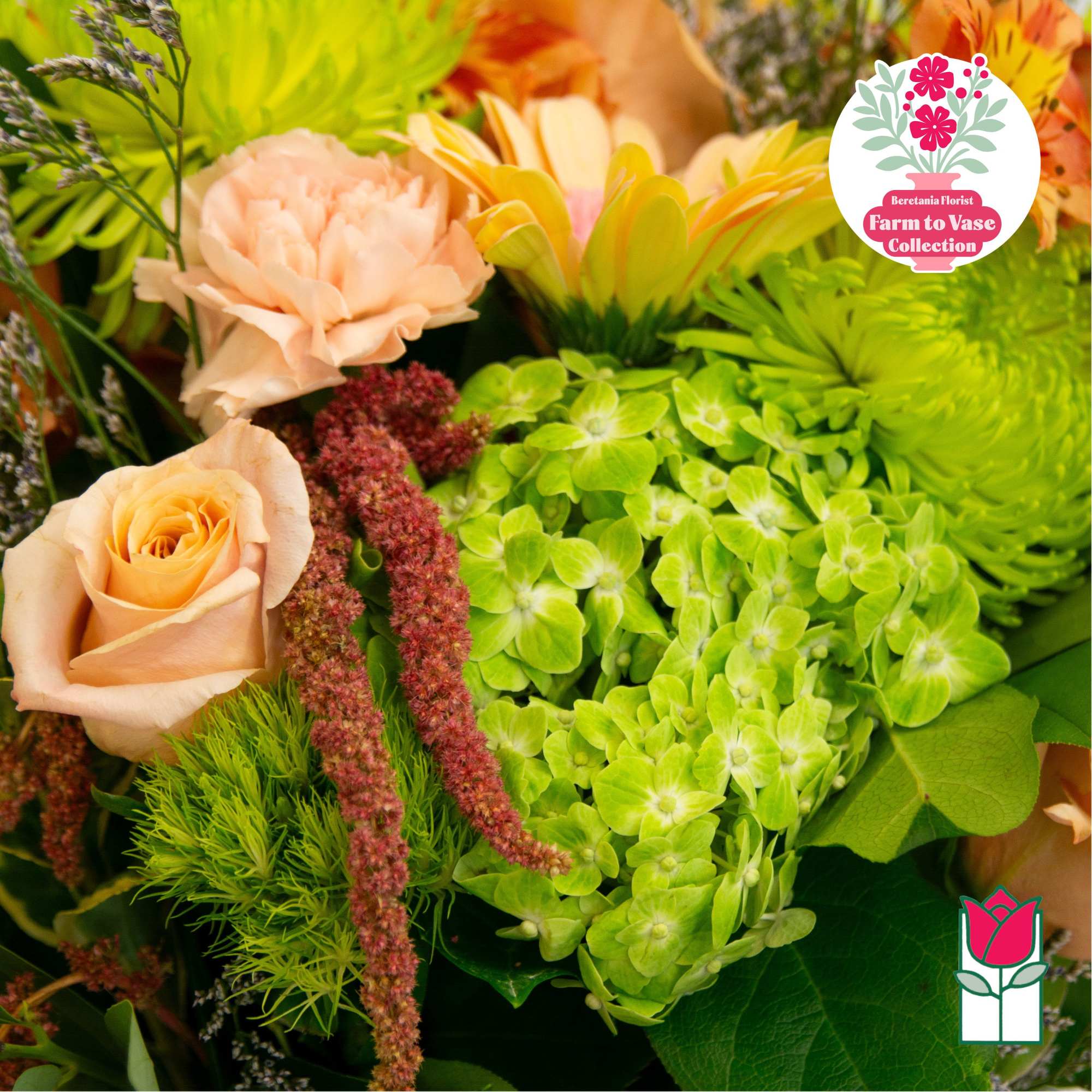 Mixed bouquet with peach roses, green hydrangeas, and yellow blooms