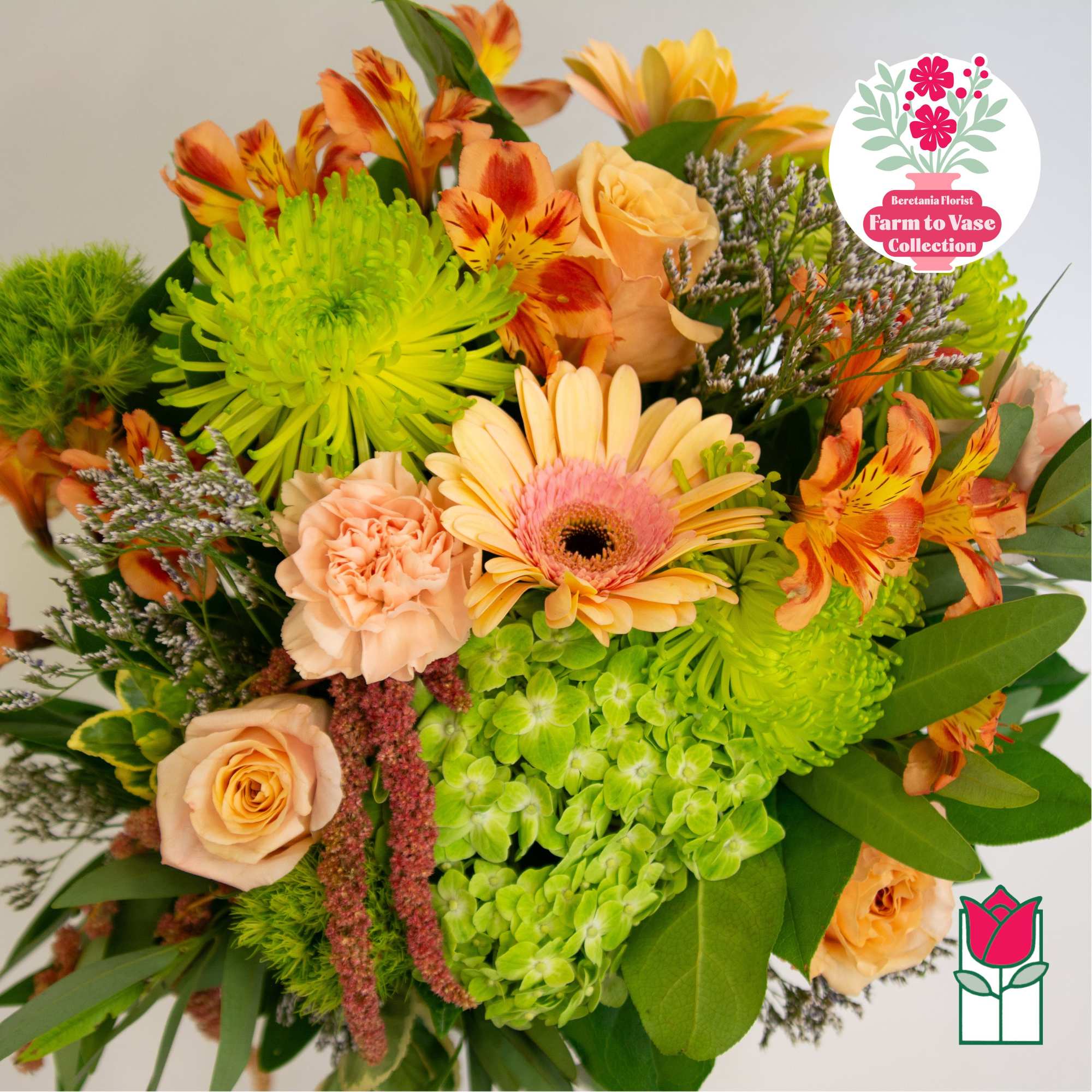 Mixed bouquet with peach roses, green chrysanthemums, and orange alstroemeria