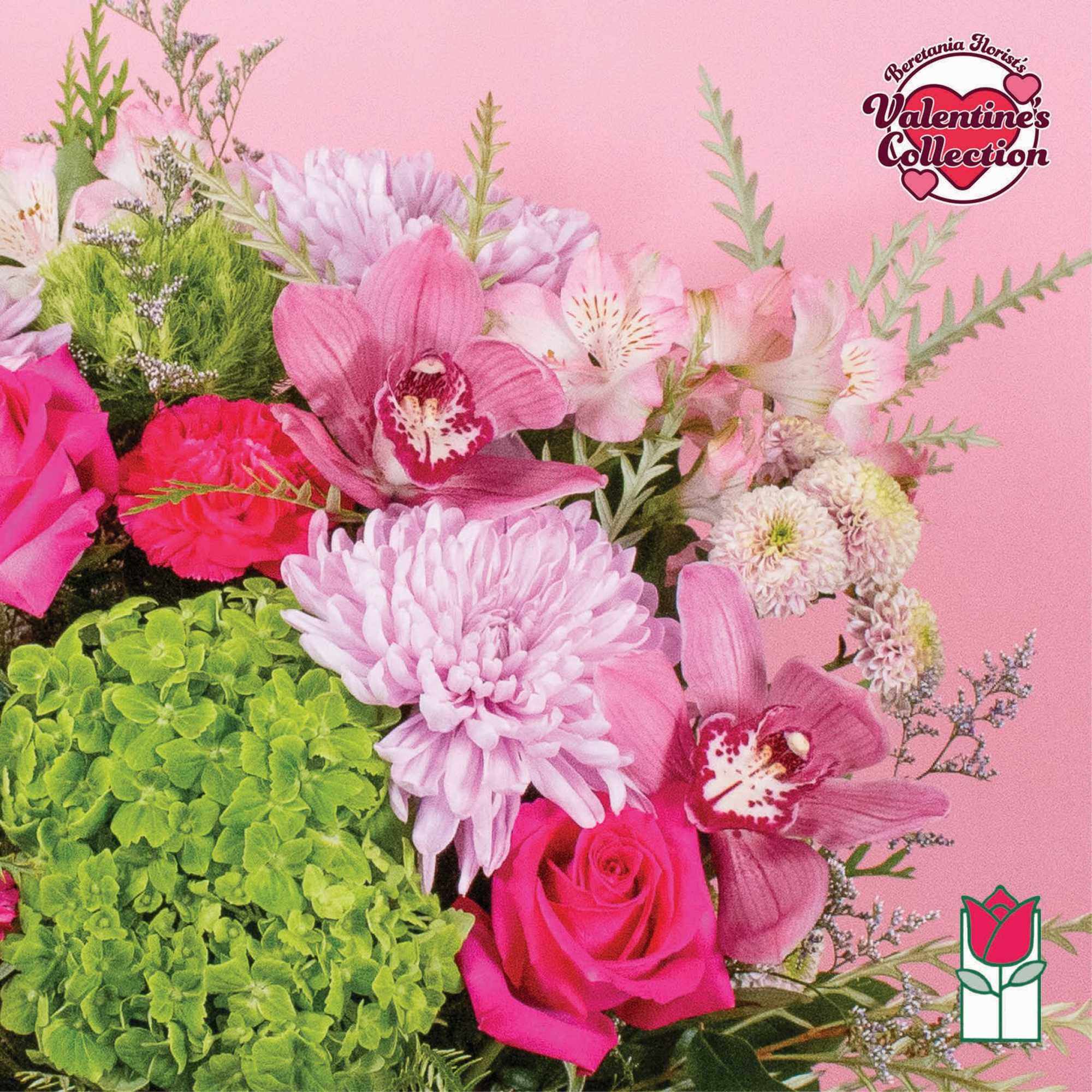 Pink roses and orchids with pale chrysanthemums in a bouquet