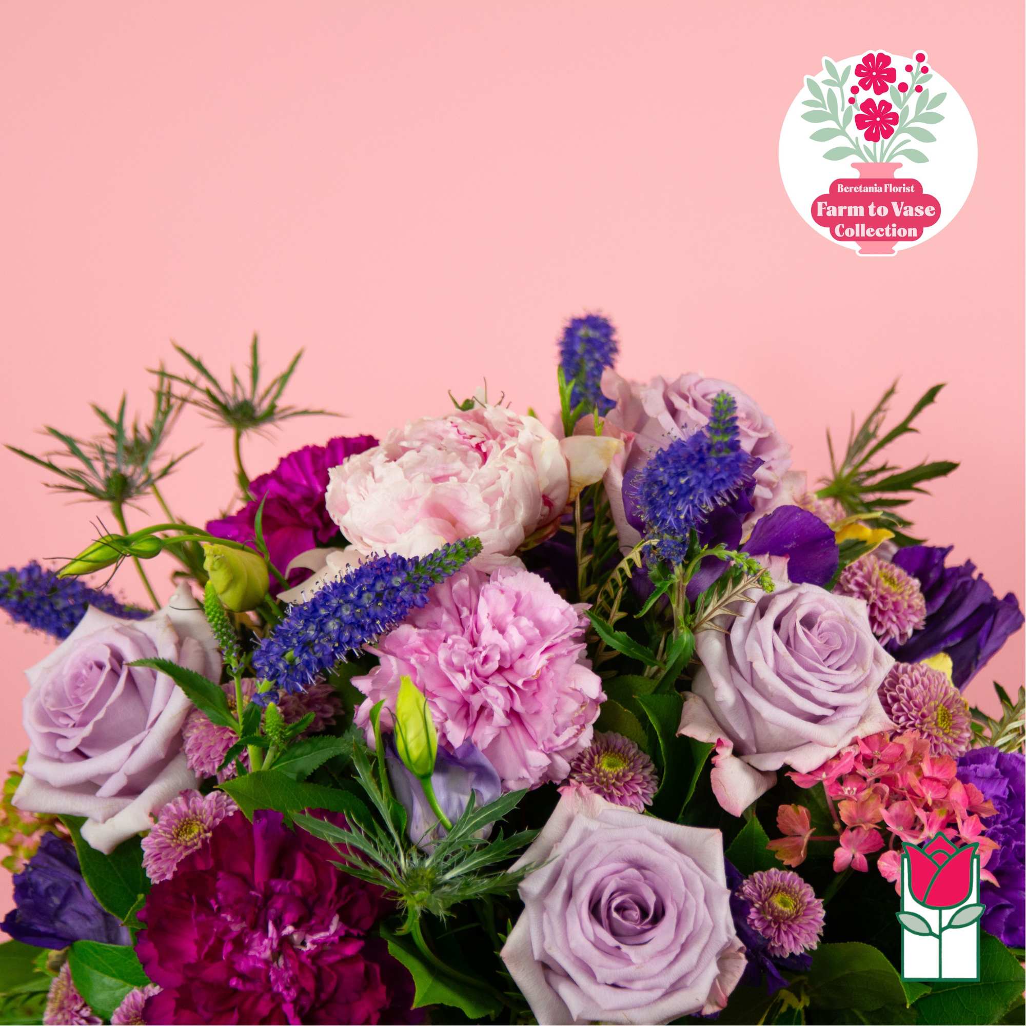 Bouquet of lavender roses, pink carnations, and purple flowers