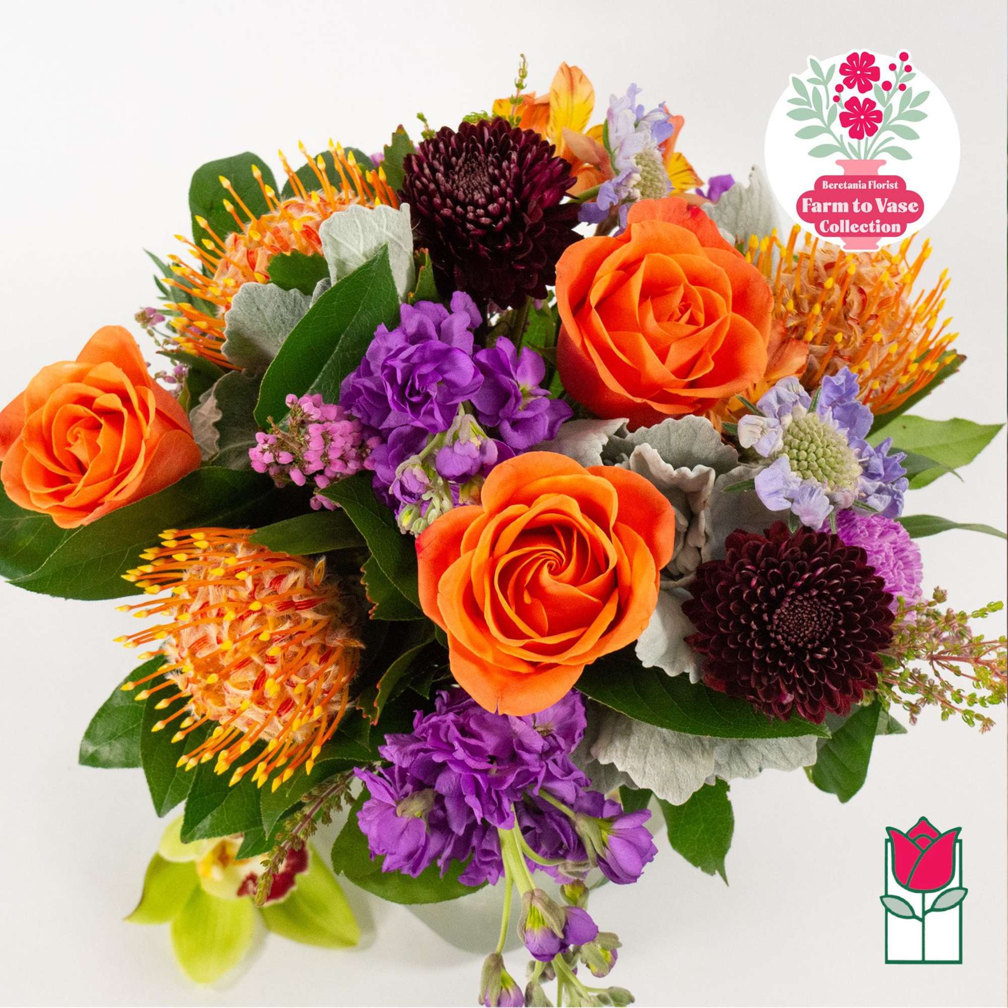 Bouquet of orange roses and purple flowers with orange pincushion blooms