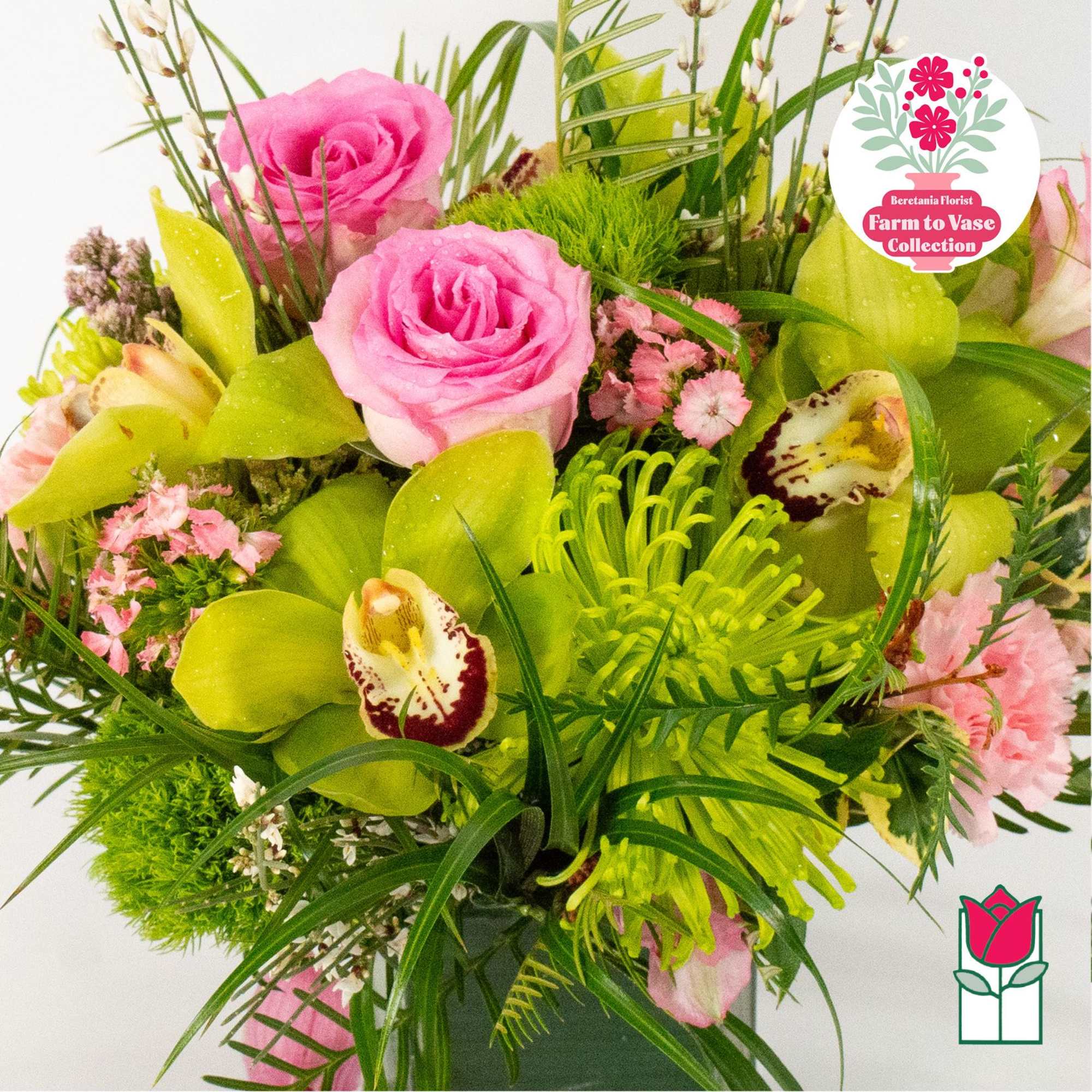Pink roses and green orchids in a mixed bouquet, photo 2 of 6