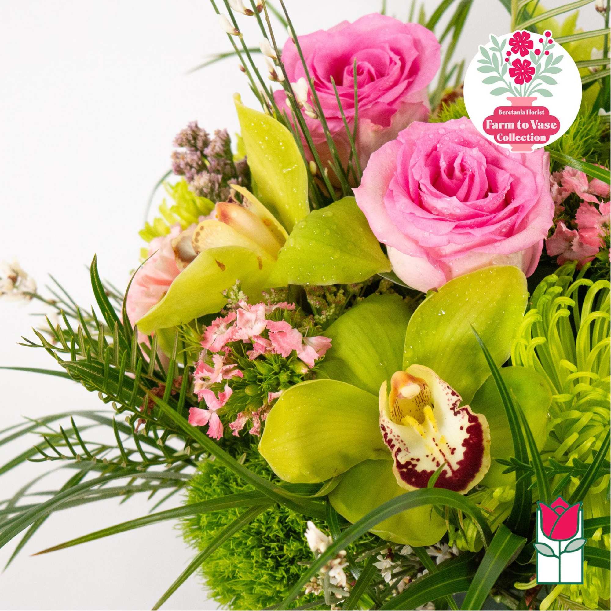 Pink roses and green orchids in a mixed bouquet, photo 3 of 6