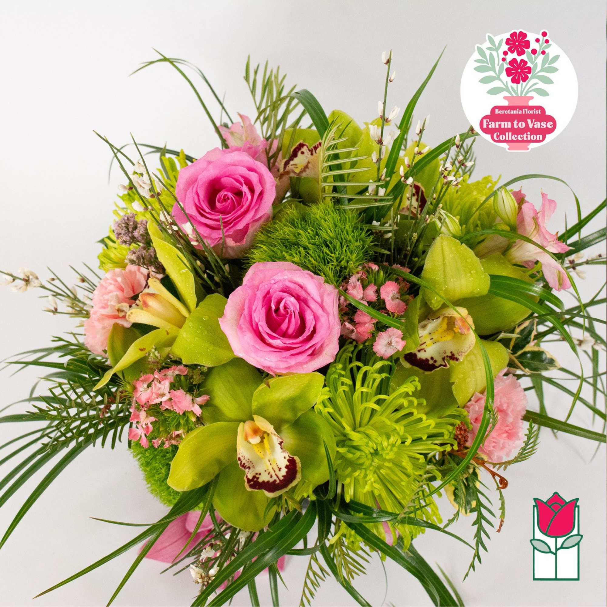 Pink roses and green orchids in a mixed bouquet, photo 4 of 6