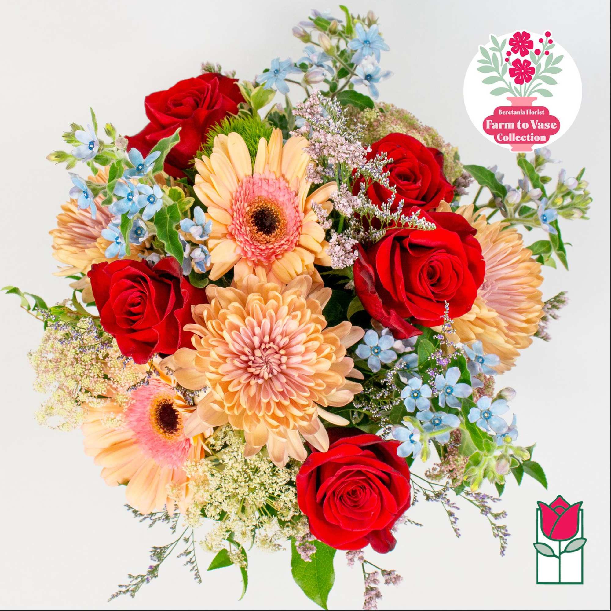 Mixed bouquet with red roses, peach gerberas, and blue flowers