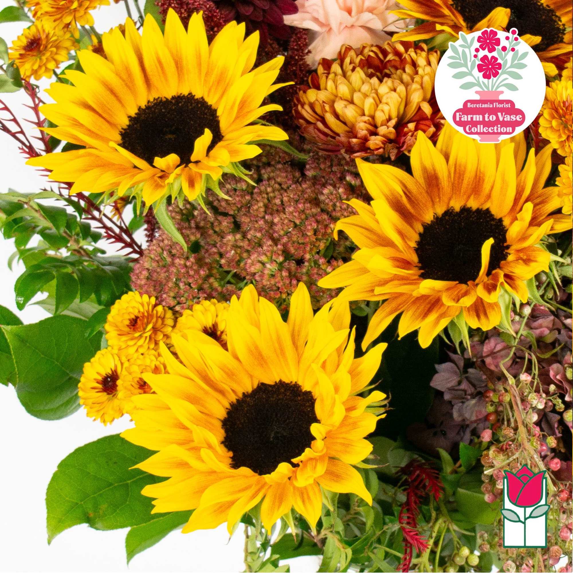 Bouquet of bright yellow sunflowers with mixed autumn flowers