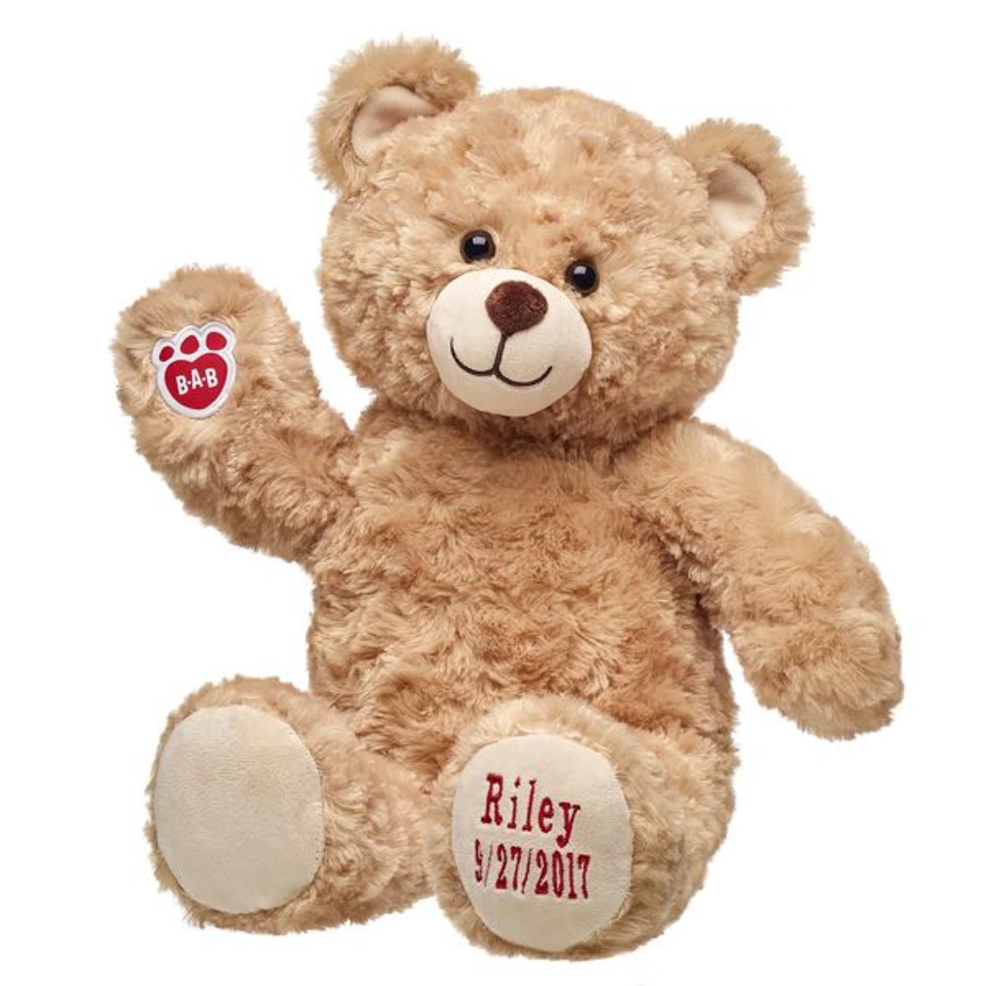 Tan plush teddy bear with a paw-print tag and embroidered foot