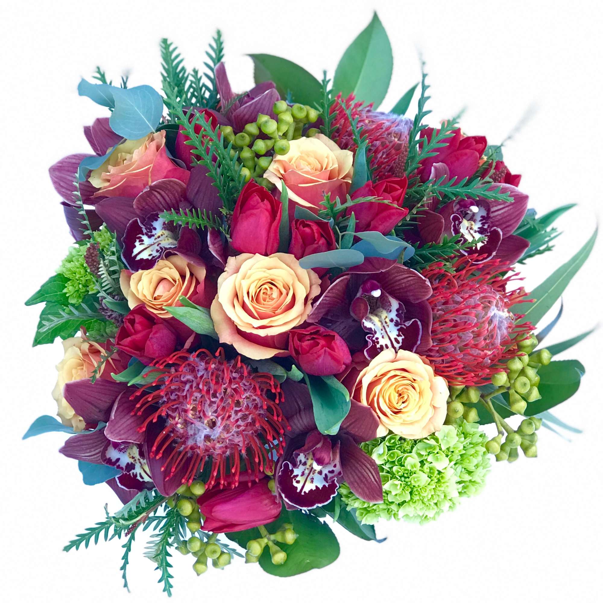 Bouquet of peach roses, burgundy orchids, and red tropical blooms