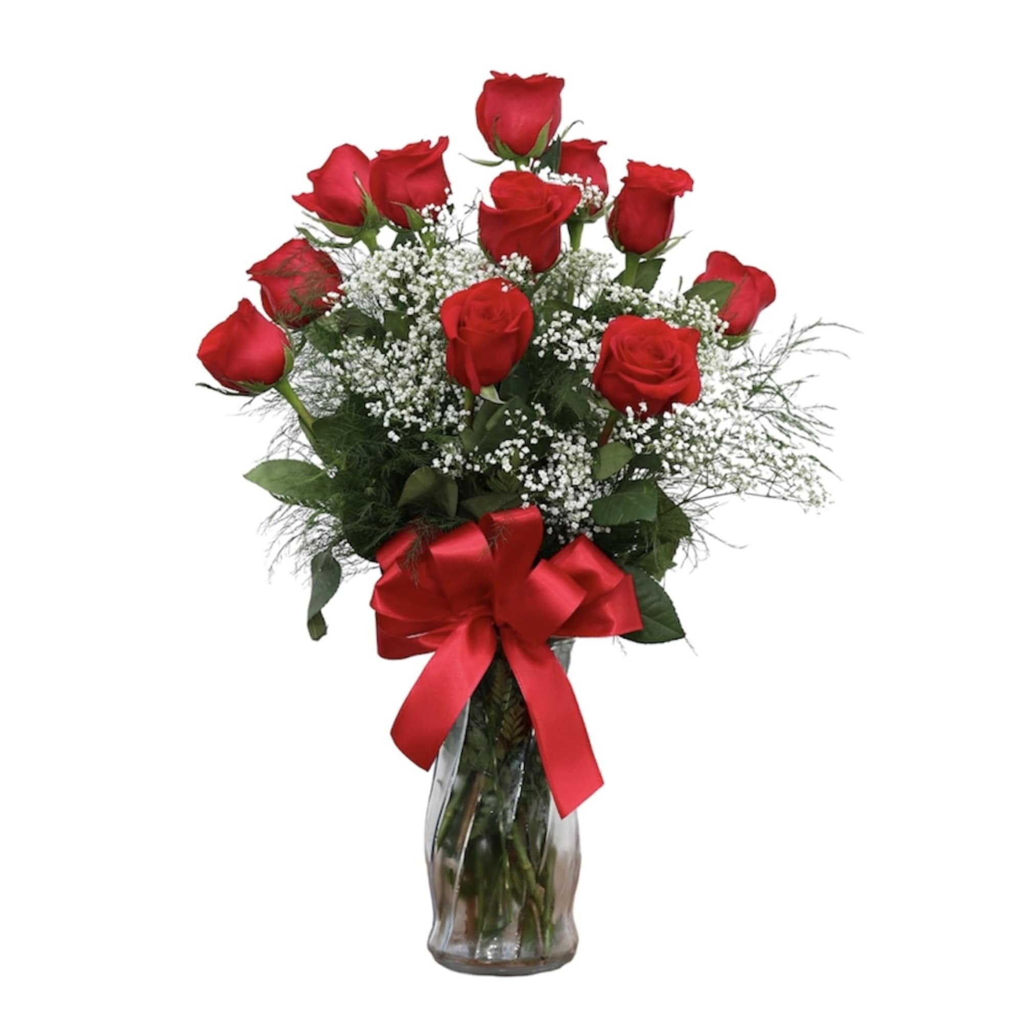 Red roses arranged in a clear glass vase with a red ribbon