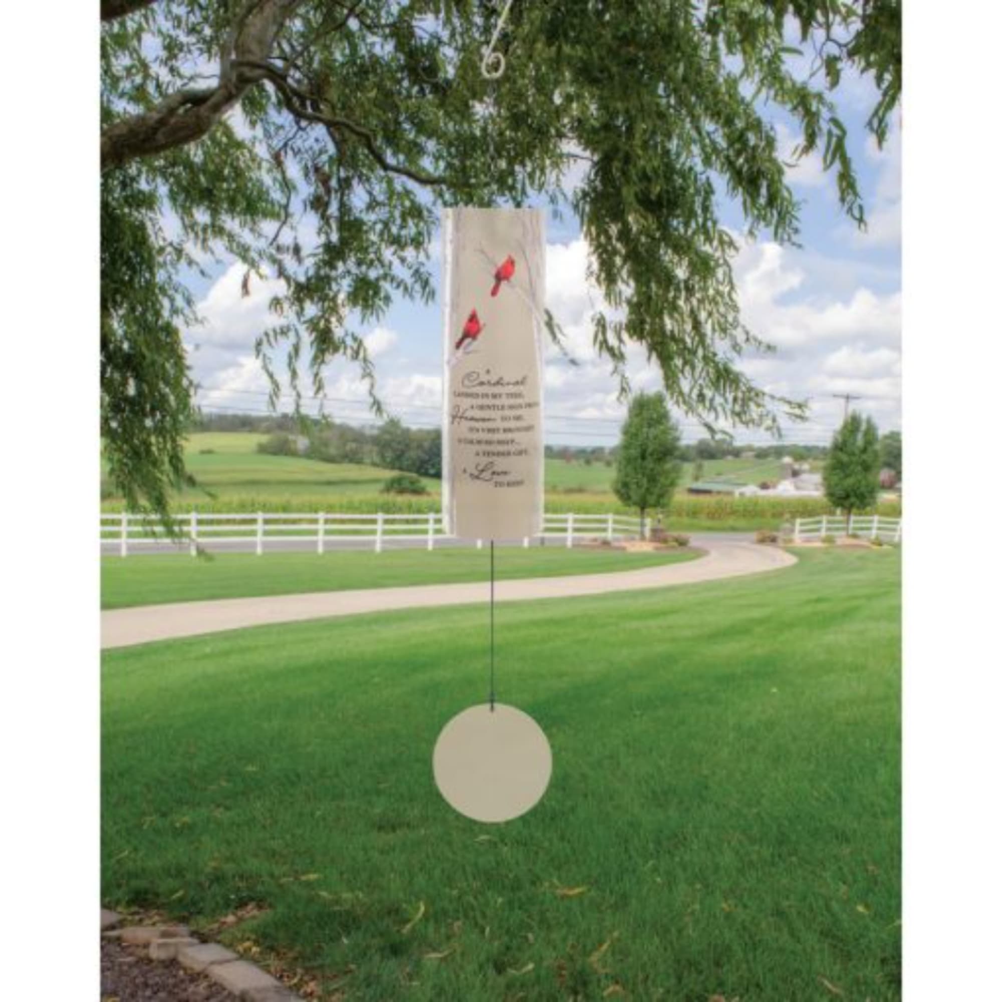 Hanging memorial wind chime with a printed message and round clapper