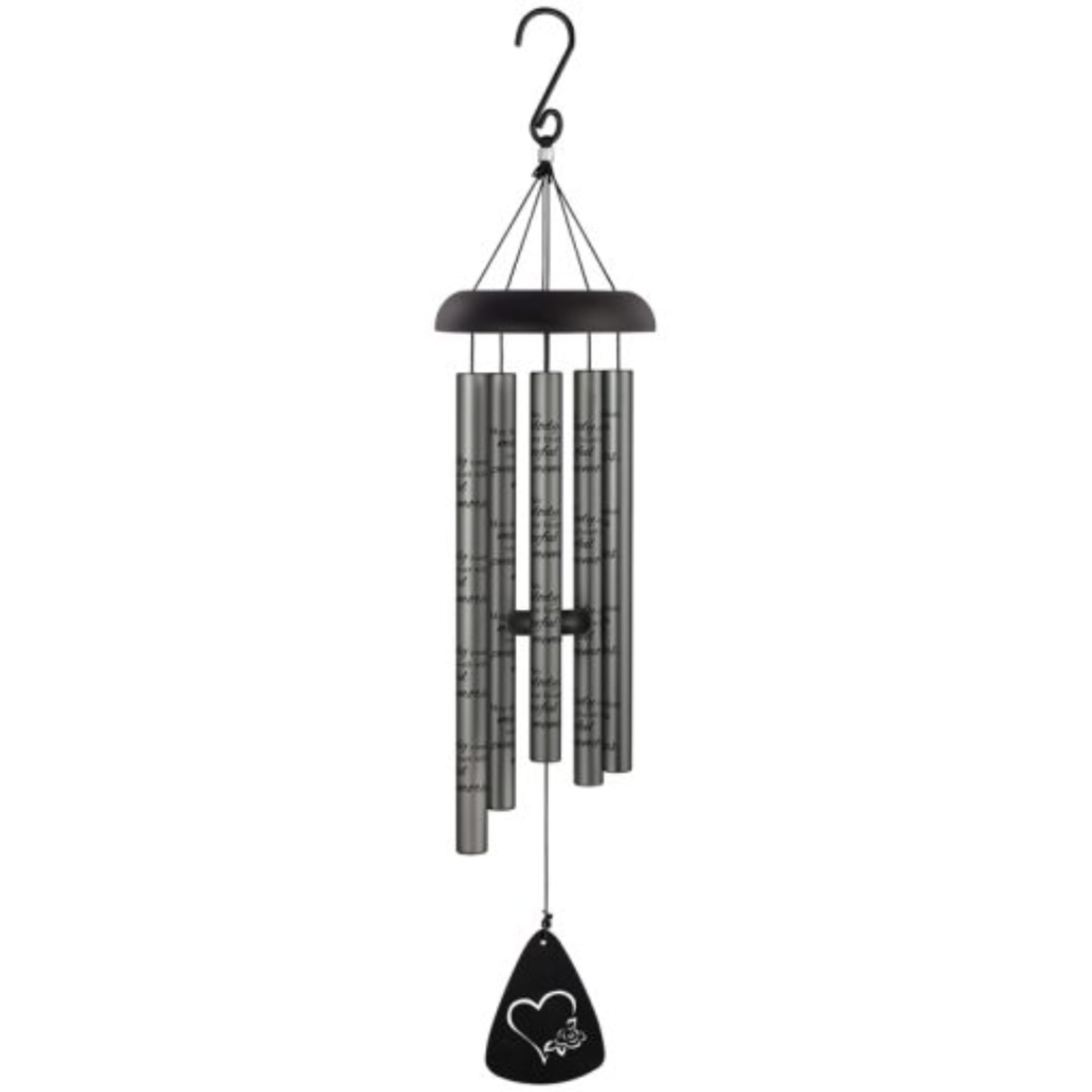 Black and silver wind chime hanging against a white background